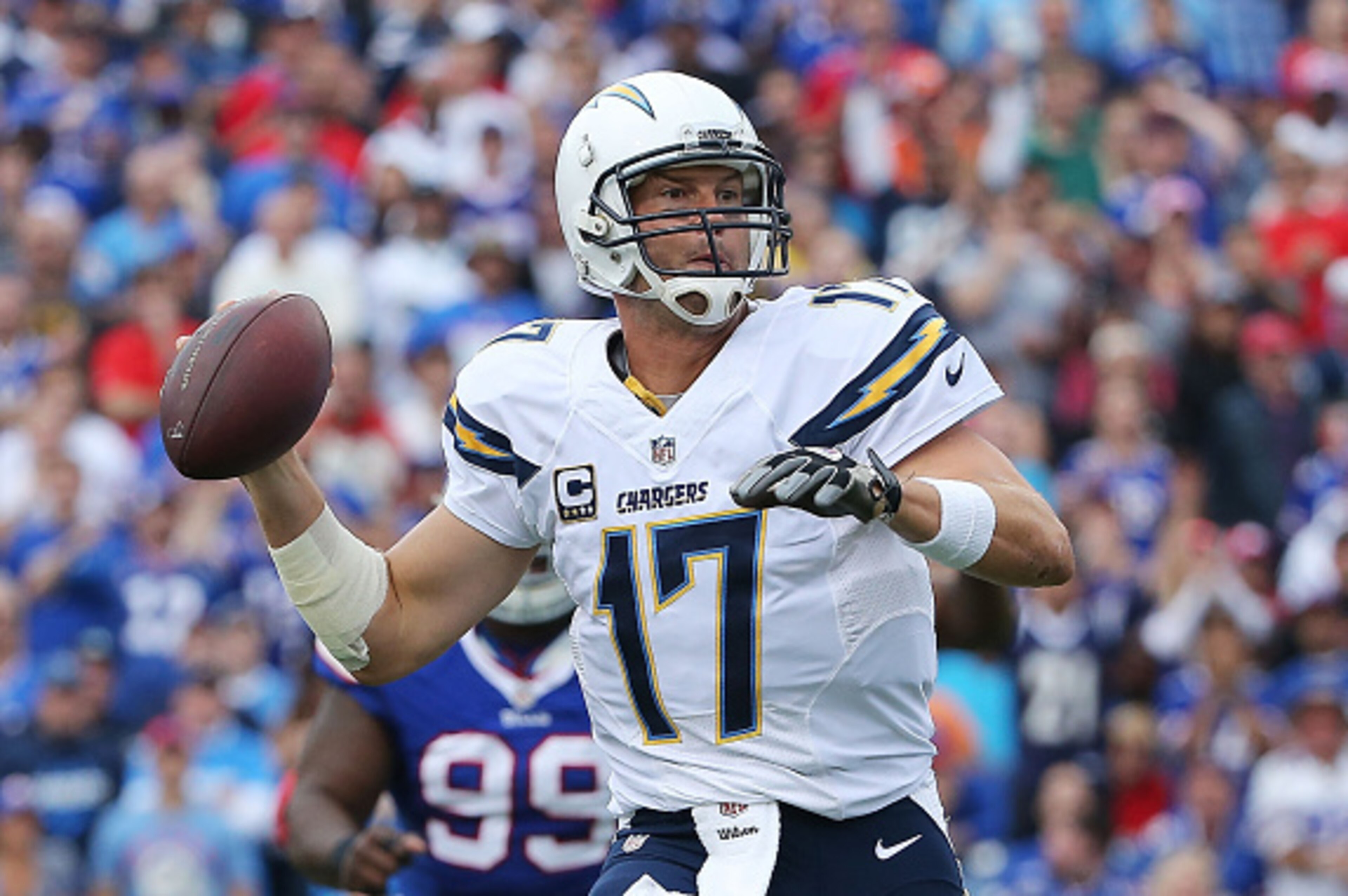 ORCHARD PARK, NY - SEPTEMBER 21:  Philip Rivers #17 of the San Diego Chargers throws against the Buffalo Bills during the first half at Ralph Wilson Stadium on September 21, 2014 in Orchard Park, New York.  (Photo by Tom Szczerbowski/Getty Images)