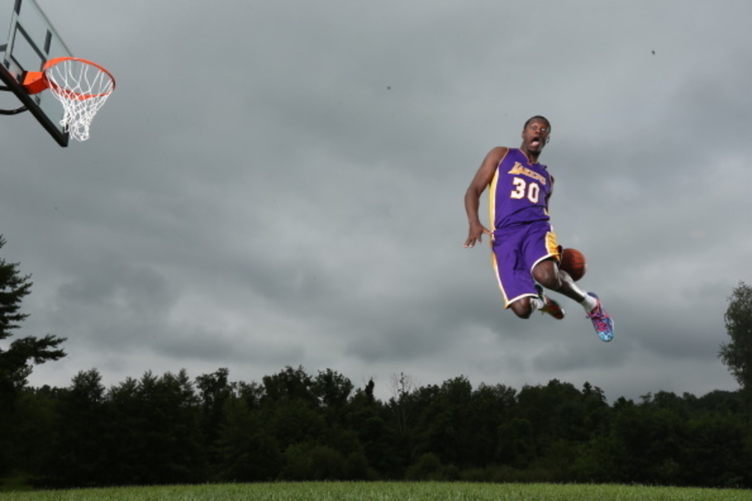TARRYTOWN, NY - AUGUST 3: Julius Randle #30 of the Los Angeles Lakers poses for a portrait during the 2014 NBA rookie photo shoot on August 3, 2014 at the Madison Square Garden Training Facility in Tarrytown, New York. NOTE TO USER: User expressly acknowl