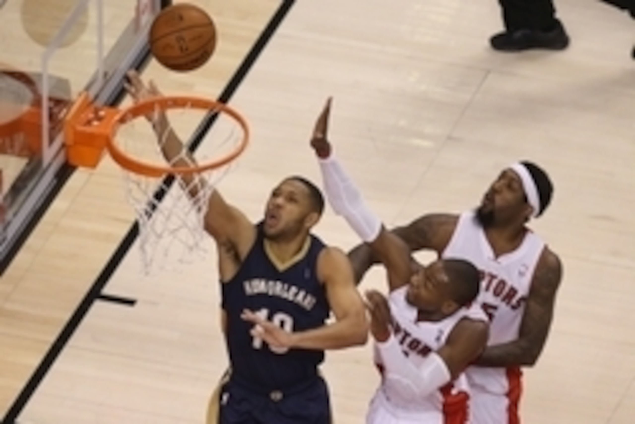 Feb 10, 2014; Toronto, Ontario, CAN; New Orleans Pelicans guard Eric Gordon (10) scores a basket against the Toronto Raptors at Air Canada Centre. Mandatory Credit: Tom Szczerbowski-USA TODAY Sports