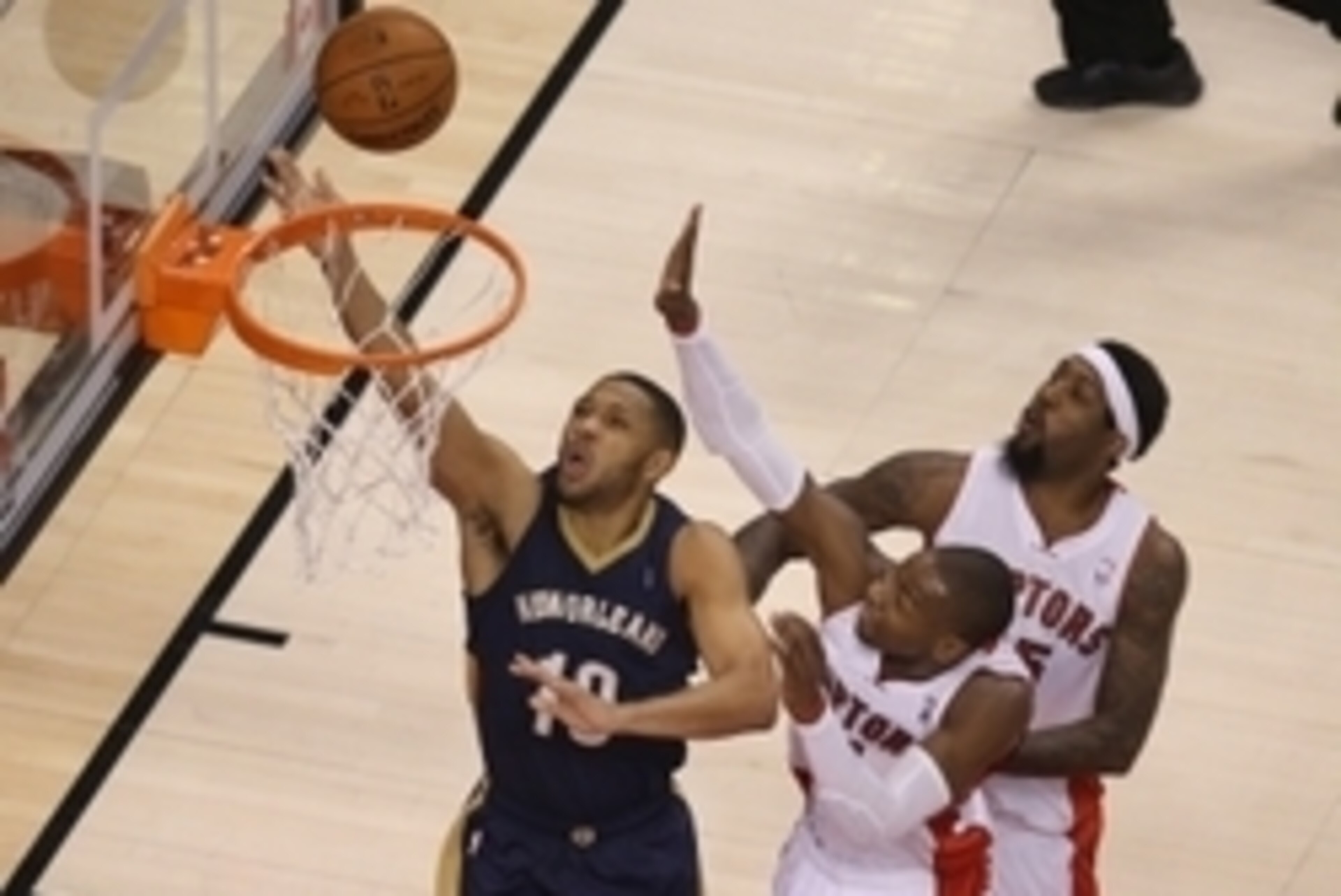 Feb 10, 2014; Toronto, Ontario, CAN; New Orleans Pelicans guard Eric Gordon (10) scores a basket against the Toronto Raptors at Air Canada Centre. Mandatory Credit: Tom Szczerbowski-USA TODAY Sports