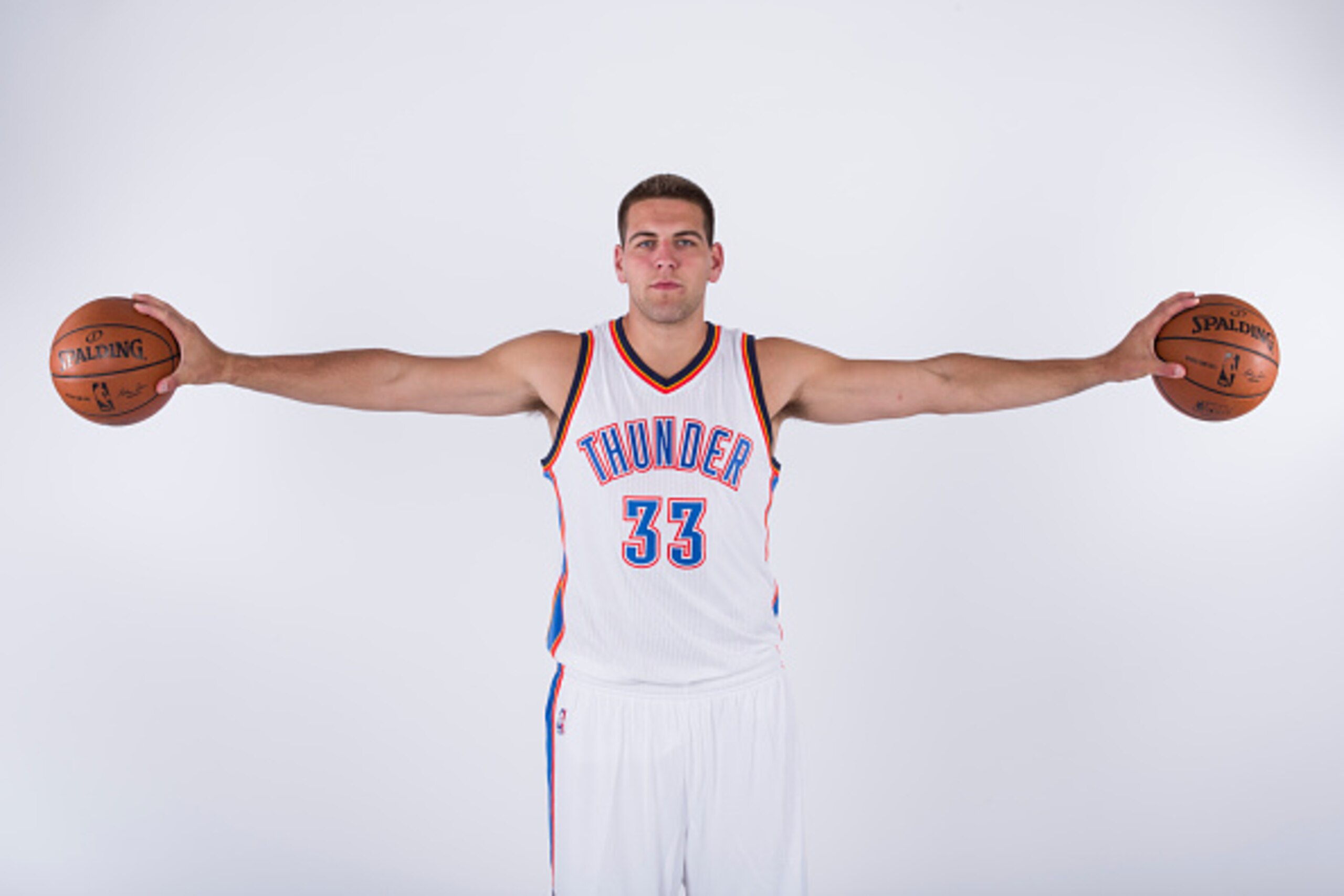 Oklahoma City, OK - SEPTEMBER 29: Mitch McGary #33 of the Oklahoma City Thunder poses for a portrait during 2014 NBA Media Day on September 27, 2014 at the Chesapeake Arena in Oklahoma City, Oklahoma. NOTE TO USER:  User expressly acknowledges and agrees 