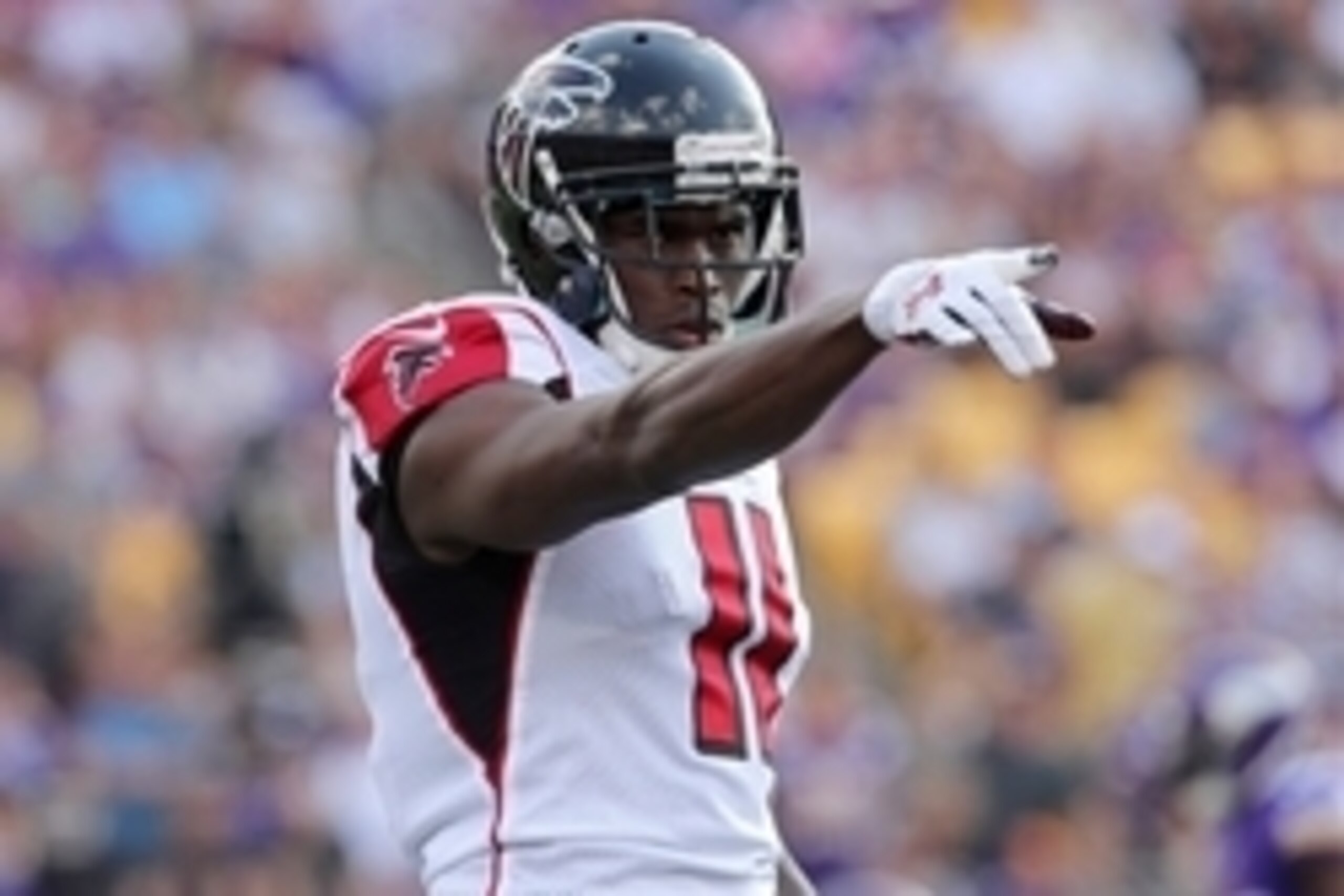 Sep 28, 2014; Minneapolis, MN, USA; Atlanta Falcons wide receiver Julio Jones (11) points during the first quarter against the Minnesota Vikings at TCF Bank Stadium. The Vikings defeated the Falcons 41-28. Mandatory Credit: Brace Hemmelgarn-USA TODAY Spor