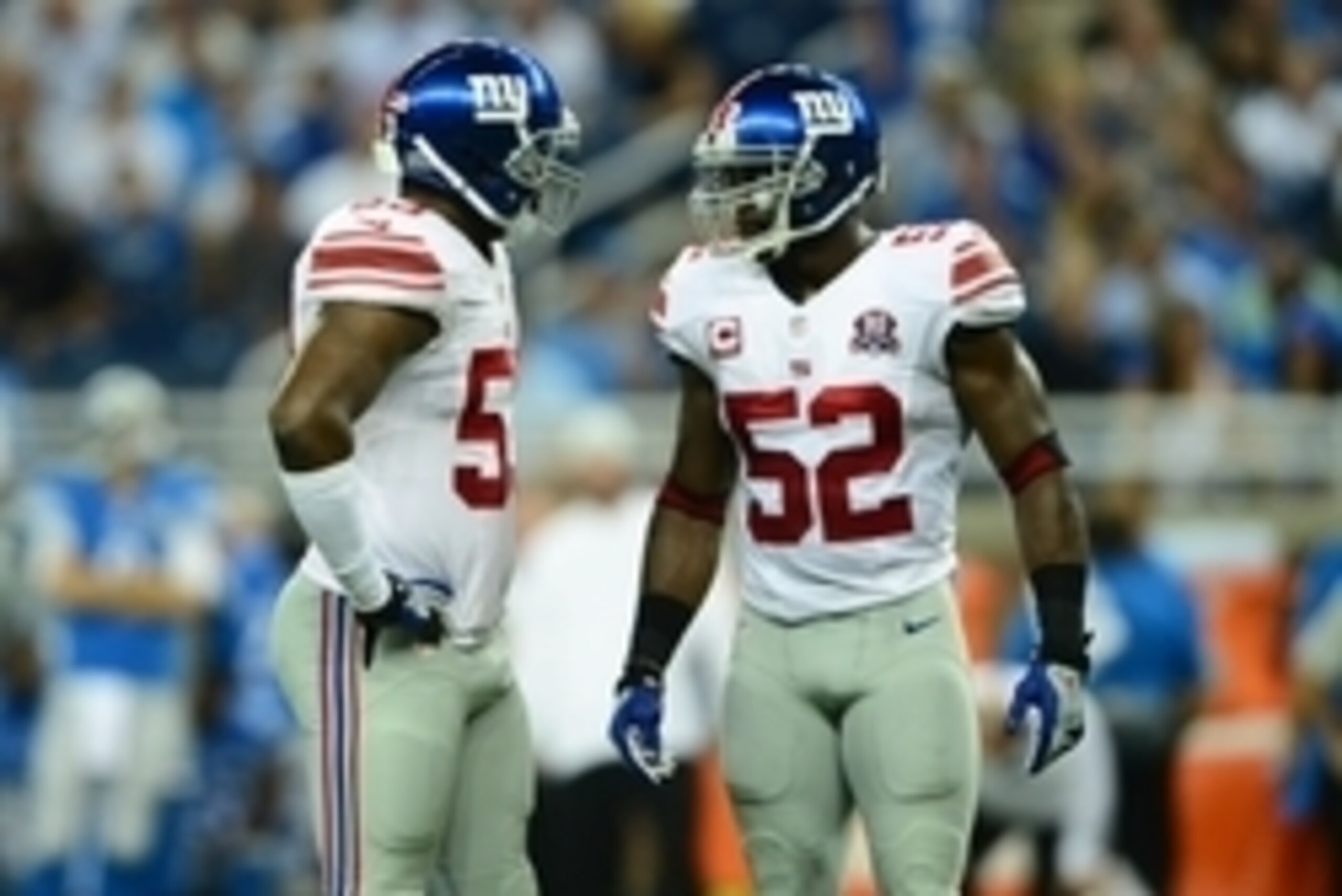 Sep 8, 2014; Detroit, MI, USA; New York Giants inside linebacker Jameel McClain (53) talks with outside linebacker Jon Beason (52) against the Detroit Lions at Ford Field. Mandatory Credit: Andrew Weber-USA TODAY Sports