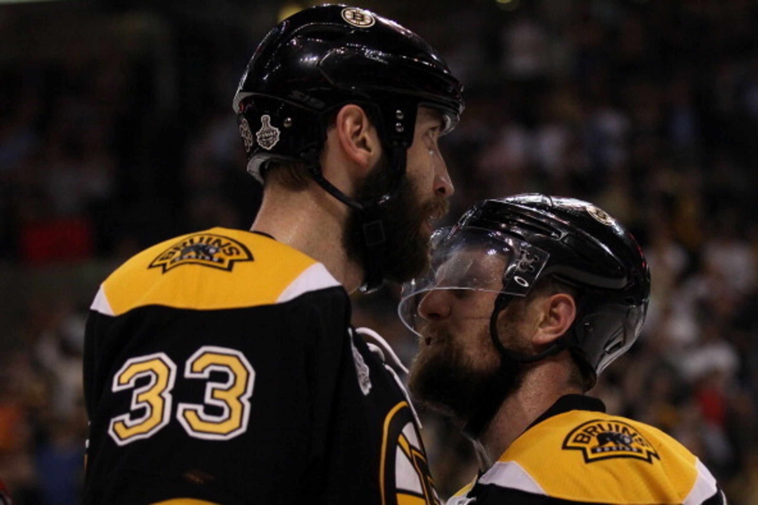 BOSTON, MA - JUNE 08:  Zdeno Chara #33 and Dennis Seidenberg #44 of the Boston Bruins talk during Game Four against the Vancouver Canucks of the 2011 NHL Stanley Cup Final at TD Garden on June 8, 2011 in Boston, Massachusetts.  (Photo by Elsa/Getty Images