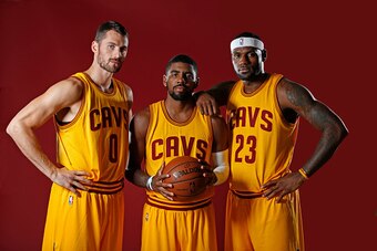 INDEPENDENCE, OH - SEPTEMBER 26:  Kevin Love #0, Kyrie Irving #2 and LeBron James #23 of the Cleveland Cavaliers poses for a photo during media day on September 26, 2014 at the Cleveland Clinic Courts in Independence, Ohio.  NOTE TO USER: User expressly a
