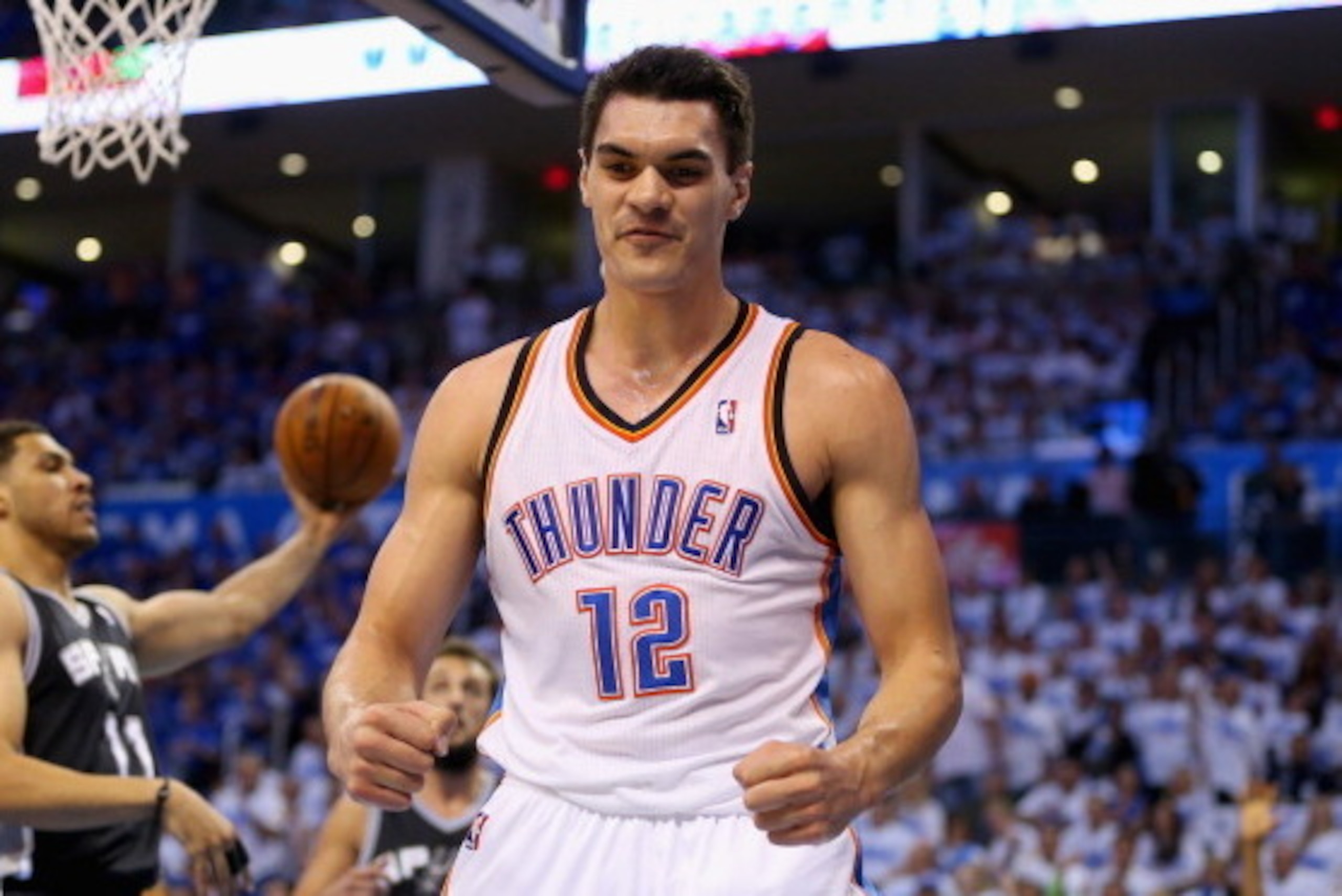 OKLAHOMA CITY, OK - MAY 27: Steven Adams #12 of the Oklahoma City Thunder reacts after a play in the second half against the San Antonio Spurs during Game Four of the Western Conference Finals of the 2014 NBA Playoffs at Chesapeake Energy Arena on May 27,
