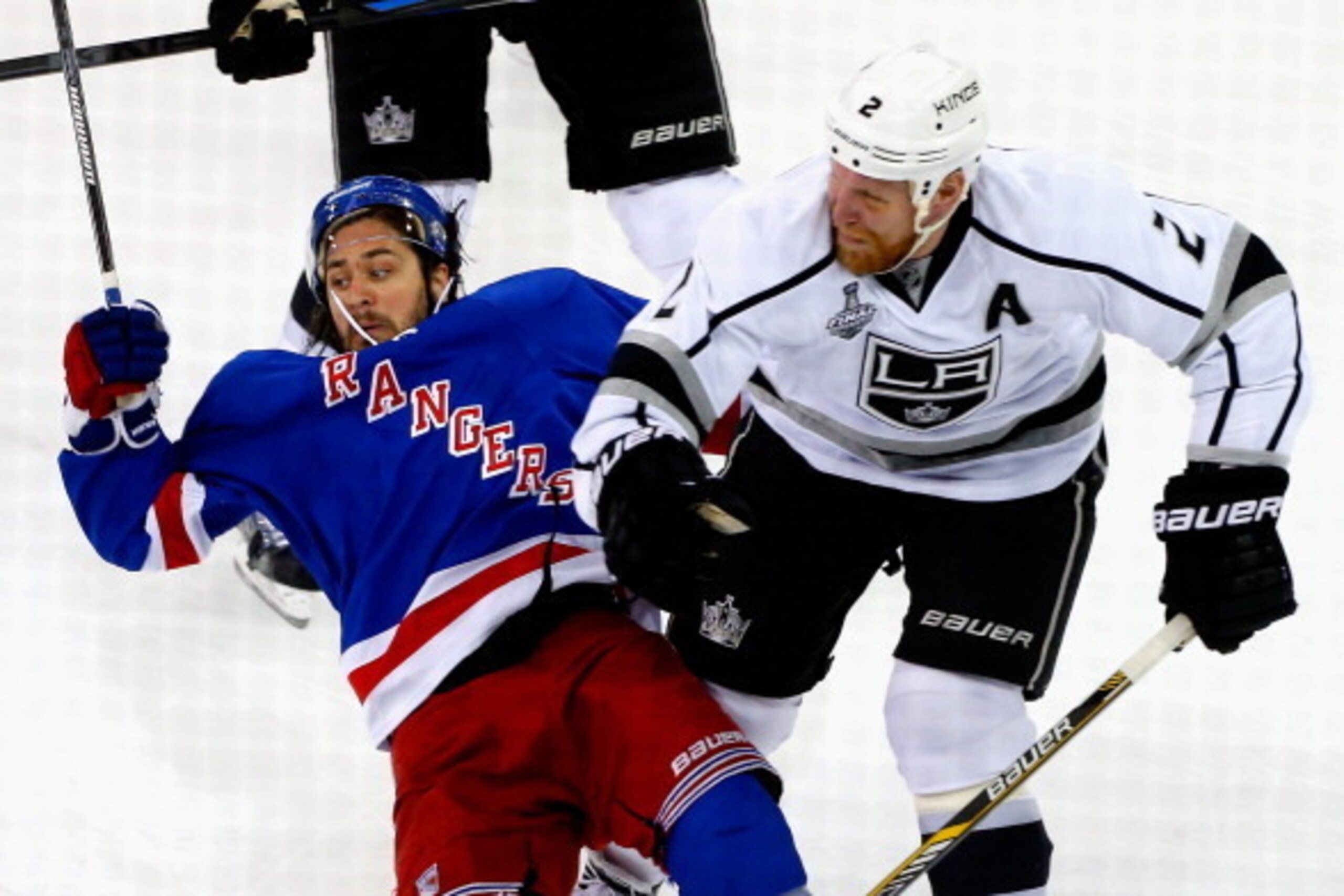NEW YORK, NY - JUNE 11:  Matt Greene #2 of the Los Angeles Kings checks Mats Zuccarello #36 of the New York Rangers during the first period of Game Four of the 2014 NHL Stanley Cup Final at Madison Square Garden on June 11, 2014 in New York, New York.  (P