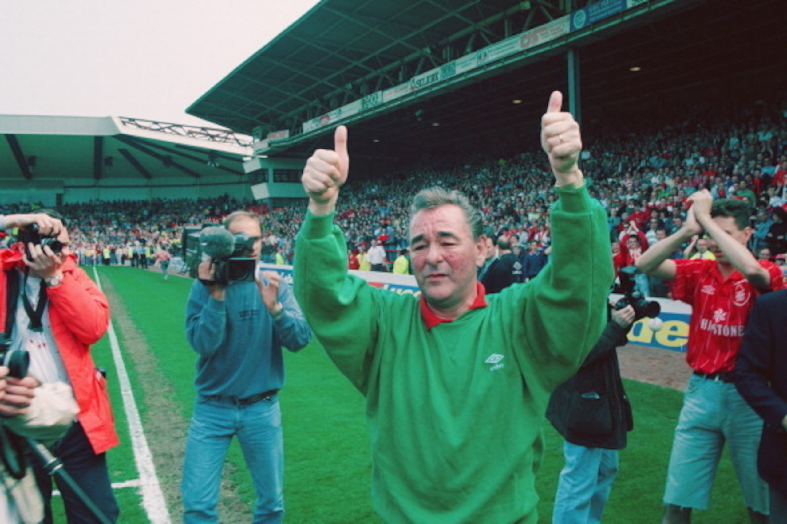 NOTTINGHAM, UNITED KINGDOM - MAY 01: Nottingham Forest mananger Brian Clough salutes the fans after his last game in charge of the club before retiring. His forest side were relegated following a home defeat to Sheffield United at the City Ground on May NOTTINGHAM, UNITED KINGDOM - MAY 01: Nottingham Forest mananger Brian Clough salutes the fans after his last game in charge of the club before retiring. His forest side were relegated following a home defeat to Sheffield United at the City Ground on May