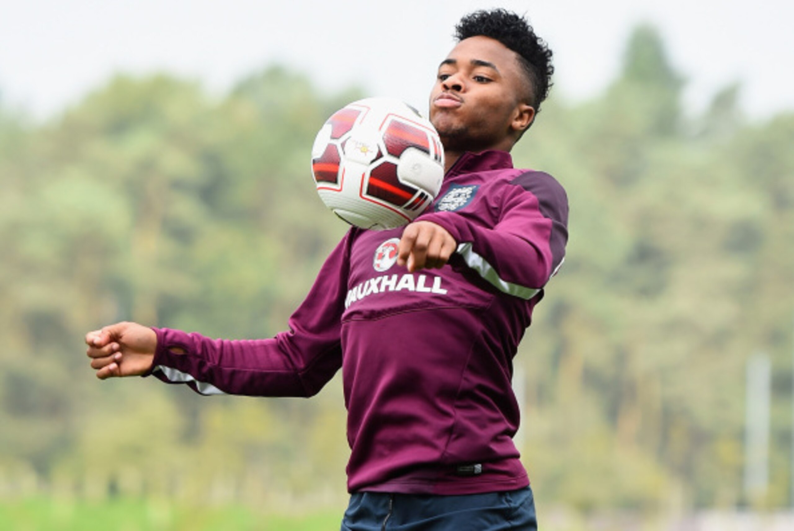 BURTON-UPON-TRENT, ENGLAND - SEPTEMBER 05:  Raheem Sterling of England in action during a training session at St Georges Park on September 5, 2014 in Burton-upon-Trent, England.  (Photo by Laurence Griffiths/Getty Images)