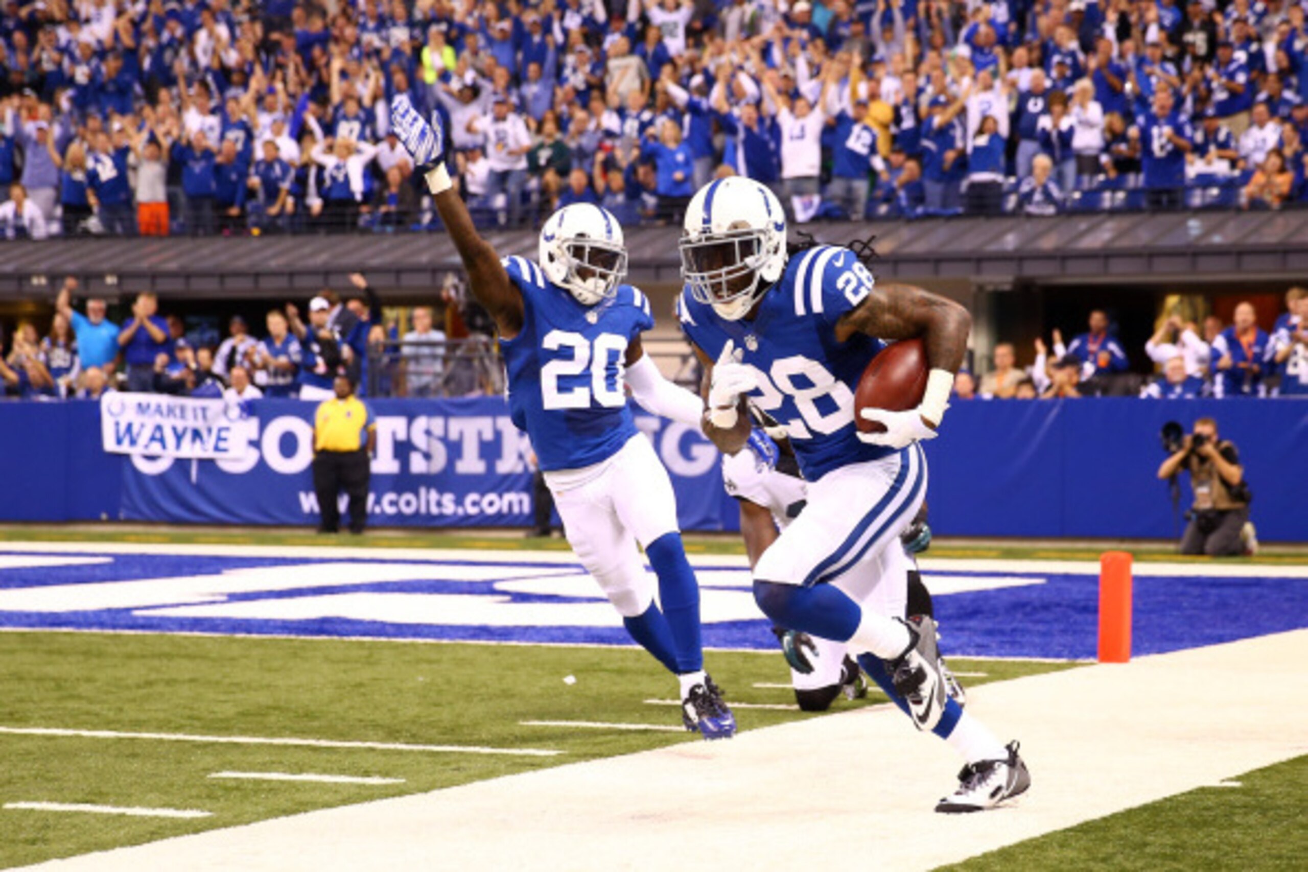 INDIANAPOLIS, IN - SEPTEMBER 15:  Greg Toler #28 of the Indianapolis Colts celebrates after intercepting a pass against the Philadelphia Eagles during a game at Lucas Oil Stadium on September 15, 2014 in Indianapolis, Indiana.  (Photo by Andy Lyons/Getty 