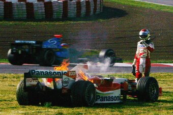 BARCELONA, SPAIN - JANUARY 26:  Jarno Trulli of Italy and Toyota suffers an engine failure during pre-season F1 Testing at the Circuit de Catalunya on January 26, 2006 in Barcelona, Spain.  (Photo by Bryn Lennon/Getty Images)