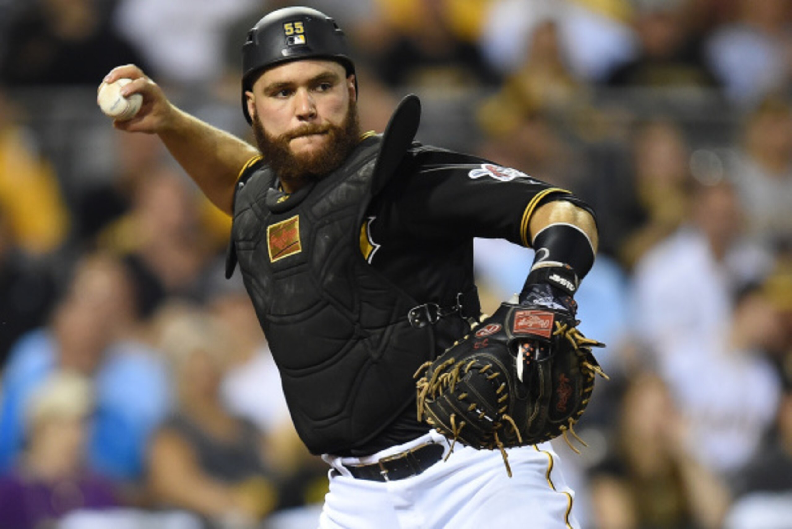 PITTSBURGH, PA - AUGUST 29:  Russell Martin #55 of the Pittsburgh Pirates throws down to first base against the Cincinnati Reds on August 29, 2014 at PNC Park in Pittsburgh, Pennsylvania.  (Photo by Joe Sargent/Getty Images)