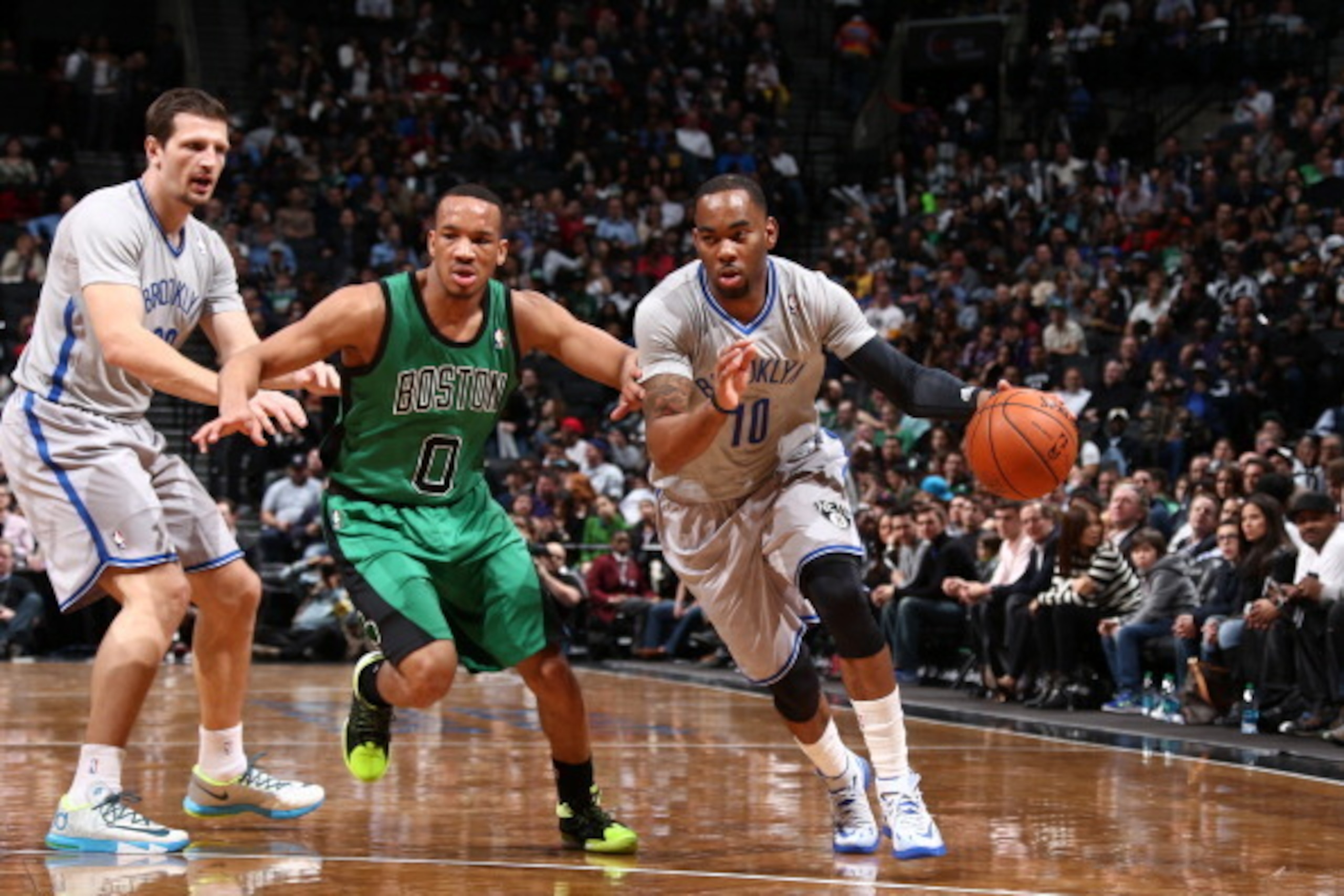 BROOKLYN, NY - MARCH 21: Marcus Thornton #10 of the Brooklyn Nets drives against Avery Bradley #0 of the Boston Celtics during a game at the Barclays Center on March 21, 2014 in the Brooklyn borough of New York City. NOTE TO USER: User expressly acknowle BROOKLYN, NY - MARCH 21: Marcus Thornton #10 of the Brooklyn Nets drives against Avery Bradley #0 of the Boston Celtics during a game at the Barclays Center on March 21, 2014 in the Brooklyn borough of New York City. NOTE TO USER: User expressly acknowle