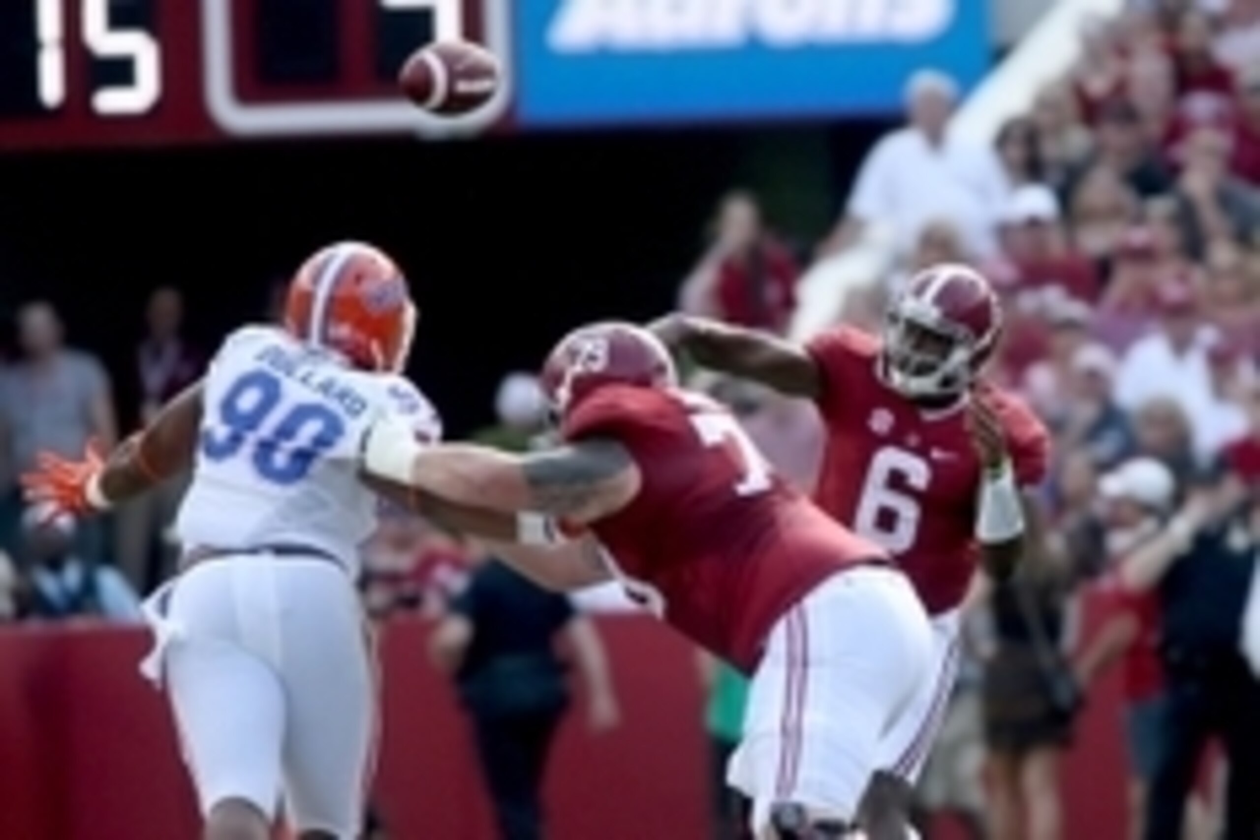 Sep 20, 2014; Tuscaloosa, AL, USA; Alabama Crimson Tide quarterback Blake Sims (6) attempts a pass as Alabama Crimson Tide offensive linesman Austin Shepherd (79) blocks Florida Gators defensive lineman Jonathan Bullard (90) in the first quarter of their 
