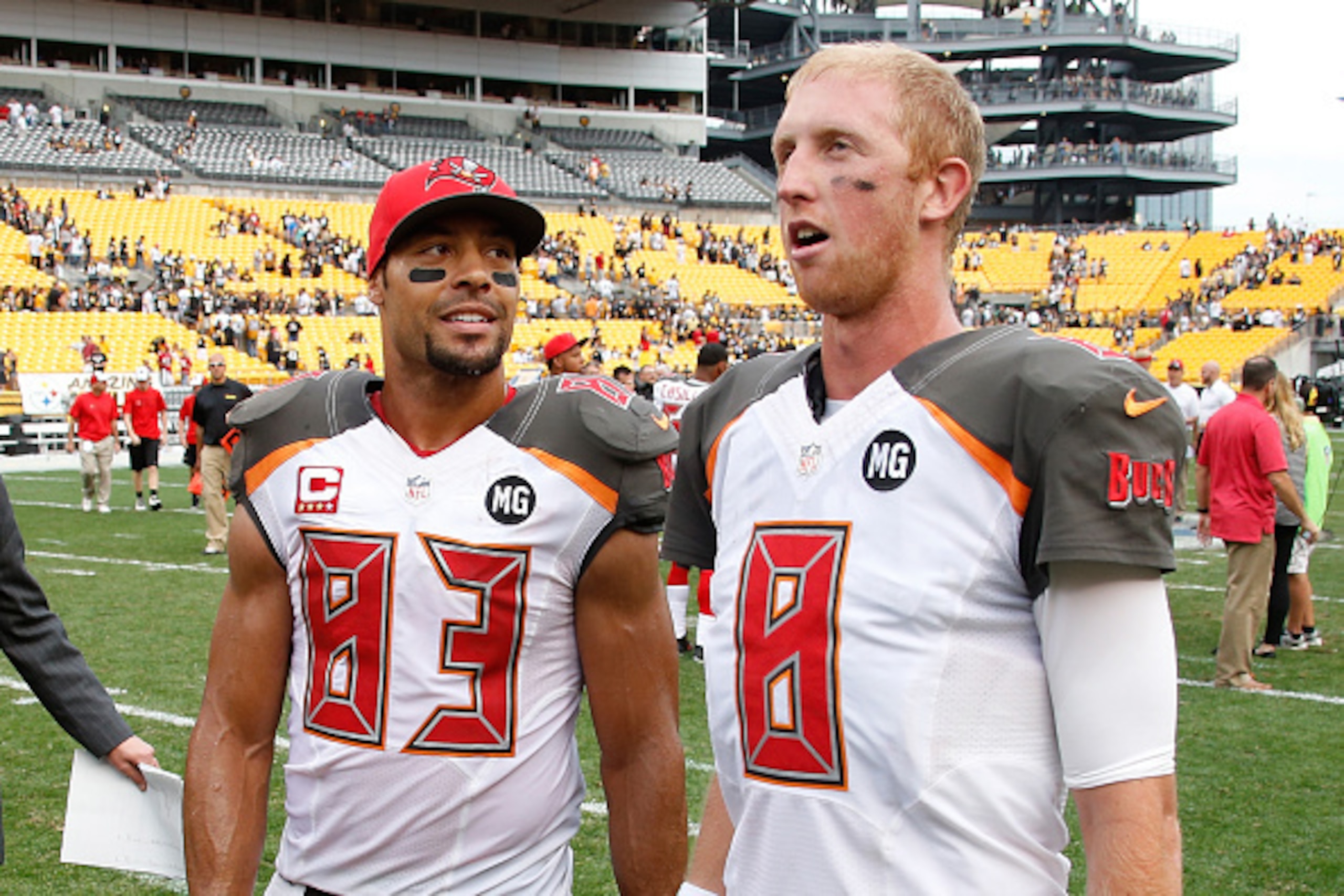 PITTSBURGH, PA - SEPTEMBER 28:  Vincent Jackson #83 talks with Mike Glennon #8 of the Tampa Bay Buccaneers after a 27-24 win over the Pittsburgh Steelers at Heinz Field on September 28, 2014 in Pittsburgh, Pennsylvania.  (Photo by Gregory Shamus/Getty Ima