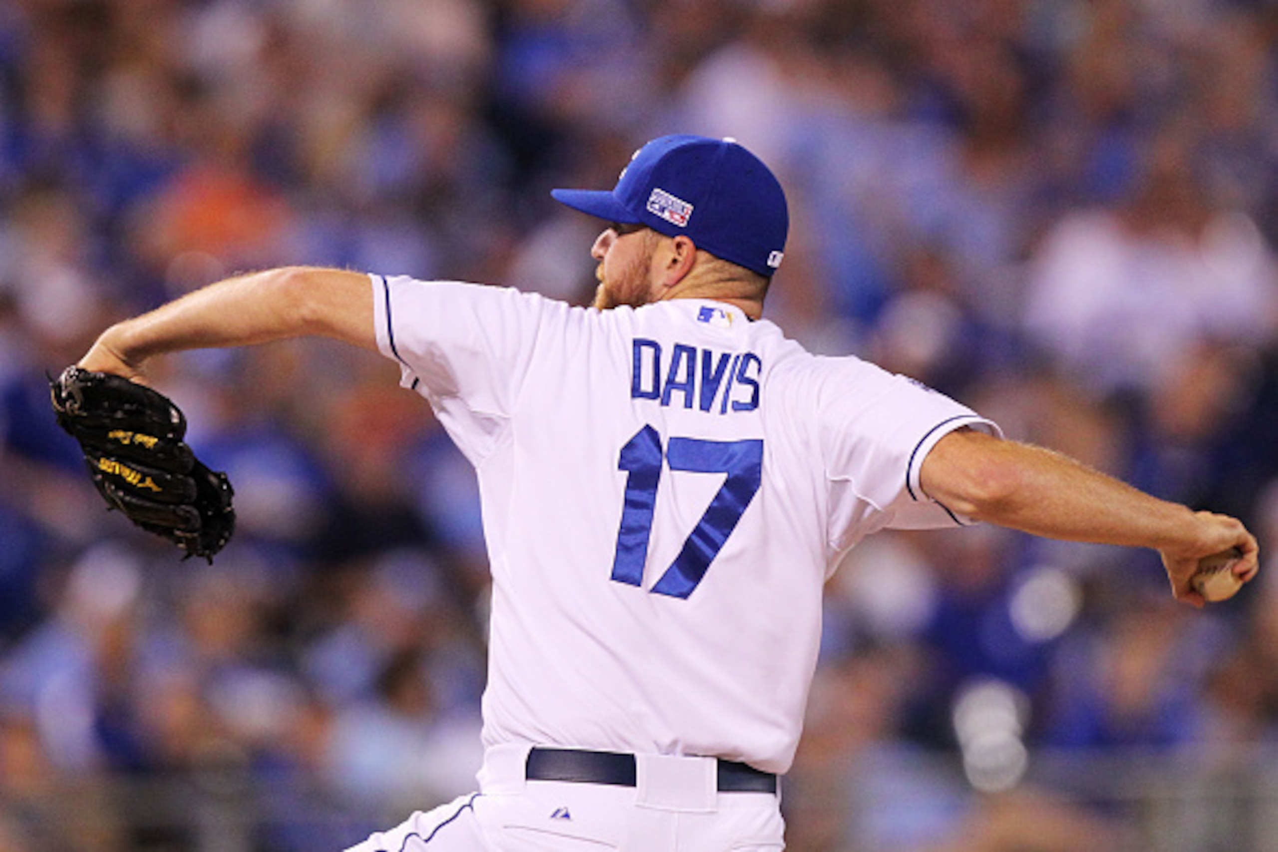 KANSAS CITY, MO - SEPTEMBER 30:  Wade Davis #17 of the Kansas City Royals pitches in the eighth inning against the Oakland Athletics during the American League Wild Card game at Kauffman Stadium on September 30, 2014 in Kansas City, Missouri.  (Photo by E