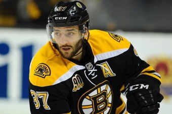 BOSTON, MA - MAY 10: Patrice Bergeron #37 of the Boston Bruins during warm ups before the game against the Montreal Canadiens in Game Five of the Second Round of the 2014 Stanley Cup Playoffs at TD Garden on May 10, 2014 in Boston, Massachusetts. (Photo b