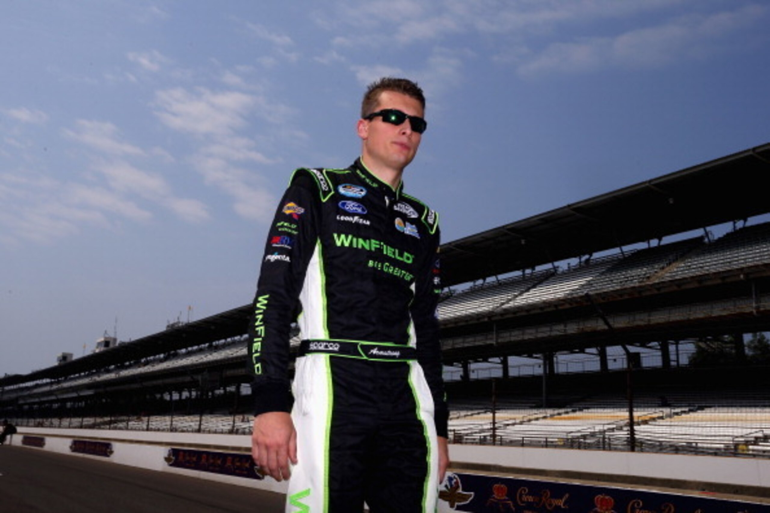 INDIANAPOLIS, IN - JULY 26:  Dakoda Armstrong, driver of the #43 WinField Ford, walks on the grid during qualifying for the NASCAR Nationwide Series Lilly Diabetes 250 at Indianapolis Motor Speedway on July 26, 2014 in Indianapolis, Indiana.  (Photo by Ma