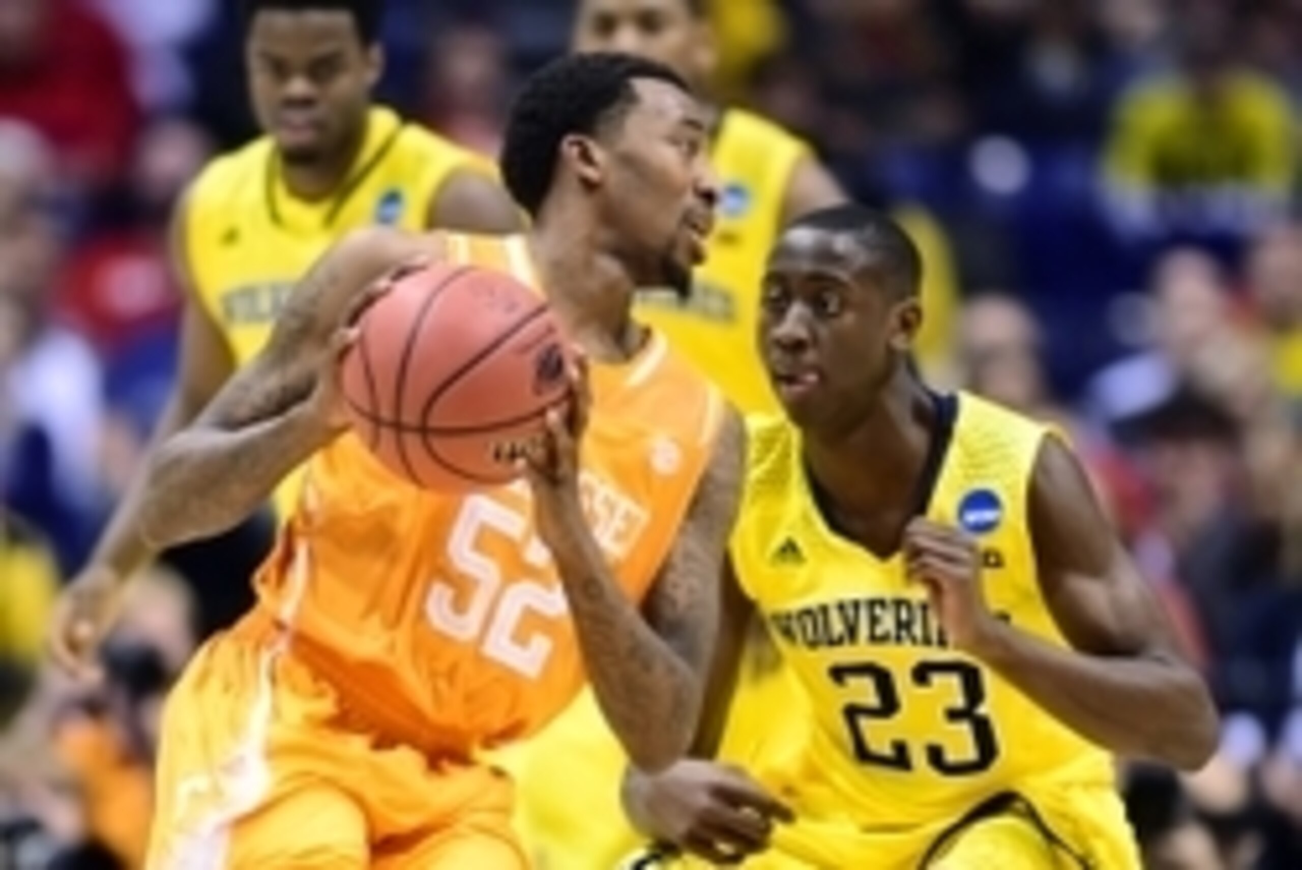 Mar 28, 2014; Indianapolis, IN, USA; Tennessee Volunteers guard Jordan McRae (52) controls the ball against Michigan Wolverines guard Caris LeVert (23) in the second half in the semifinals of the midwest regional of the 2014 NCAA Mens Basketball Champions Mar 28, 2014; Indianapolis, IN, USA; Tennessee Volunteers guard Jordan McRae (52) controls the ball against Michigan Wolverines guard Caris LeVert (23) in the second half in the semifinals of the midwest regional of the 2014 NCAA Mens Basketball Champions