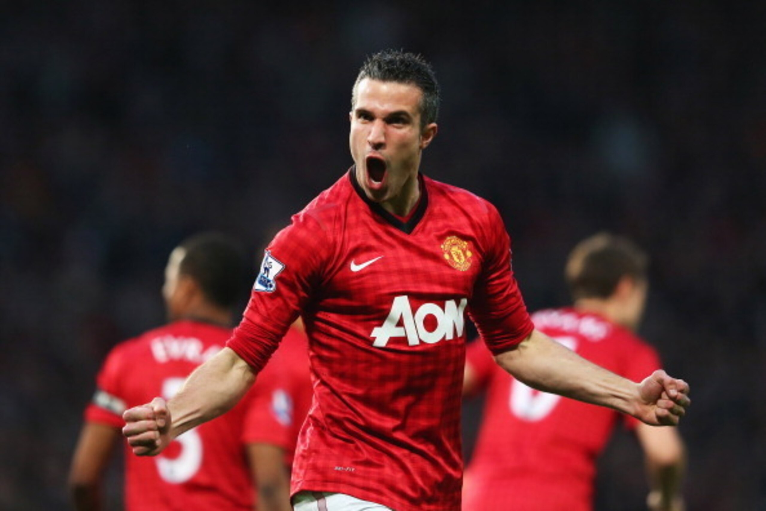 MANCHESTER, ENGLAND - APRIL 22:  Robin van Persie of Manchester United celebrates scoring the opening goal during the Barclays Premier League match between Manchester United and Aston Villa at Old Trafford on April 22, 2013 in Manchester, England.  (Photo