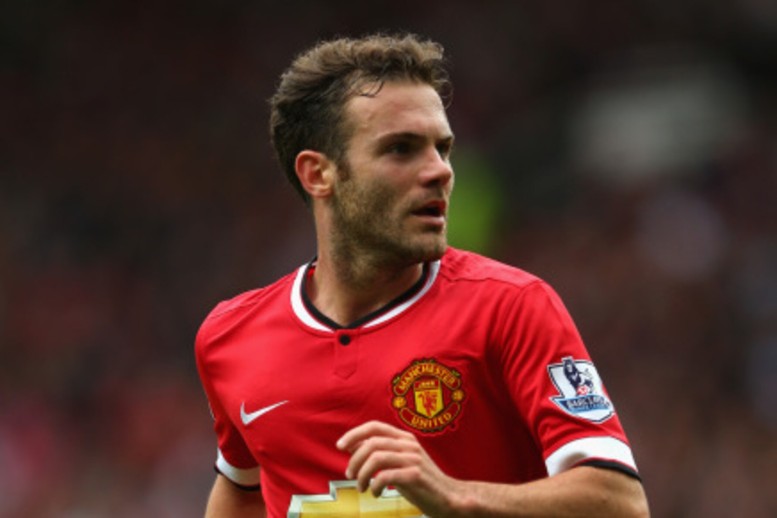 MANCHESTER, ENGLAND - AUGUST 16:  Juan Mata of Manchester United in action during the Barclays Premier League match between Manchester United and Swansea City at Old Trafford on August 16, 2014 in Manchester, England.  (Photo by Alex Livesey/Getty Images)