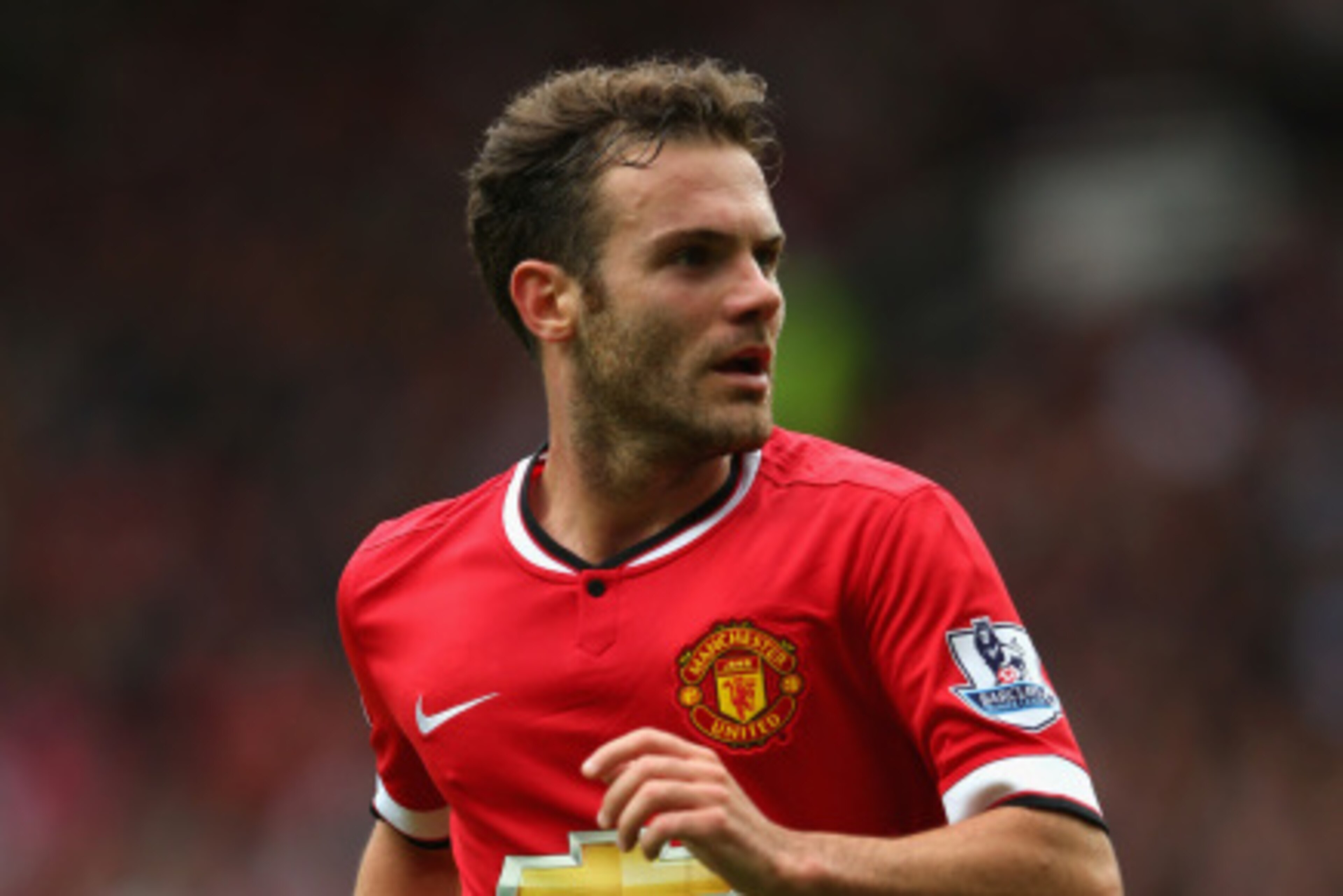 MANCHESTER, ENGLAND - AUGUST 16:  Juan Mata of Manchester United in action during the Barclays Premier League match between Manchester United and Swansea City at Old Trafford on August 16, 2014 in Manchester, England.  (Photo by Alex Livesey/Getty Images)