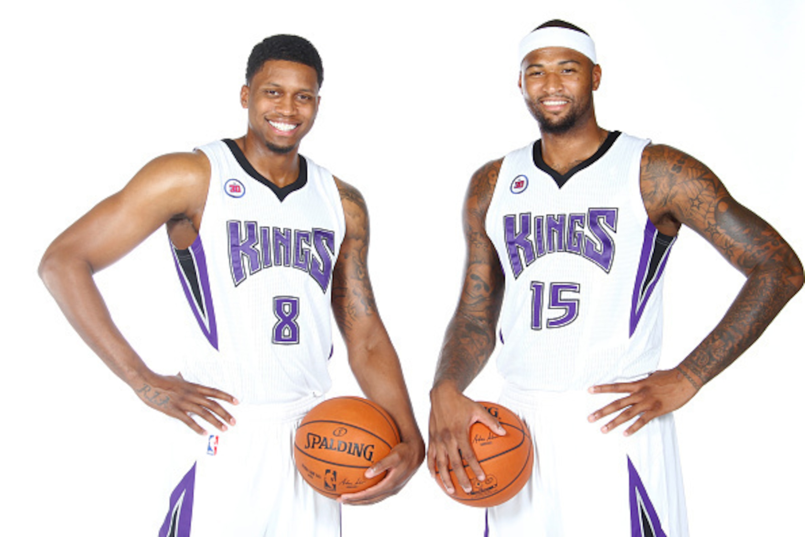 SACRAMENTO, CA - SEPTEMBER 26: Rudy Gay #8 and DeMarcus Cousins #15 of the Sacramento Kings pose for a photo on media day September 26, 2014 at the Kings practice facility in Sacramento, California. NOTE TO USER: User expressly acknowledges and agrees tha