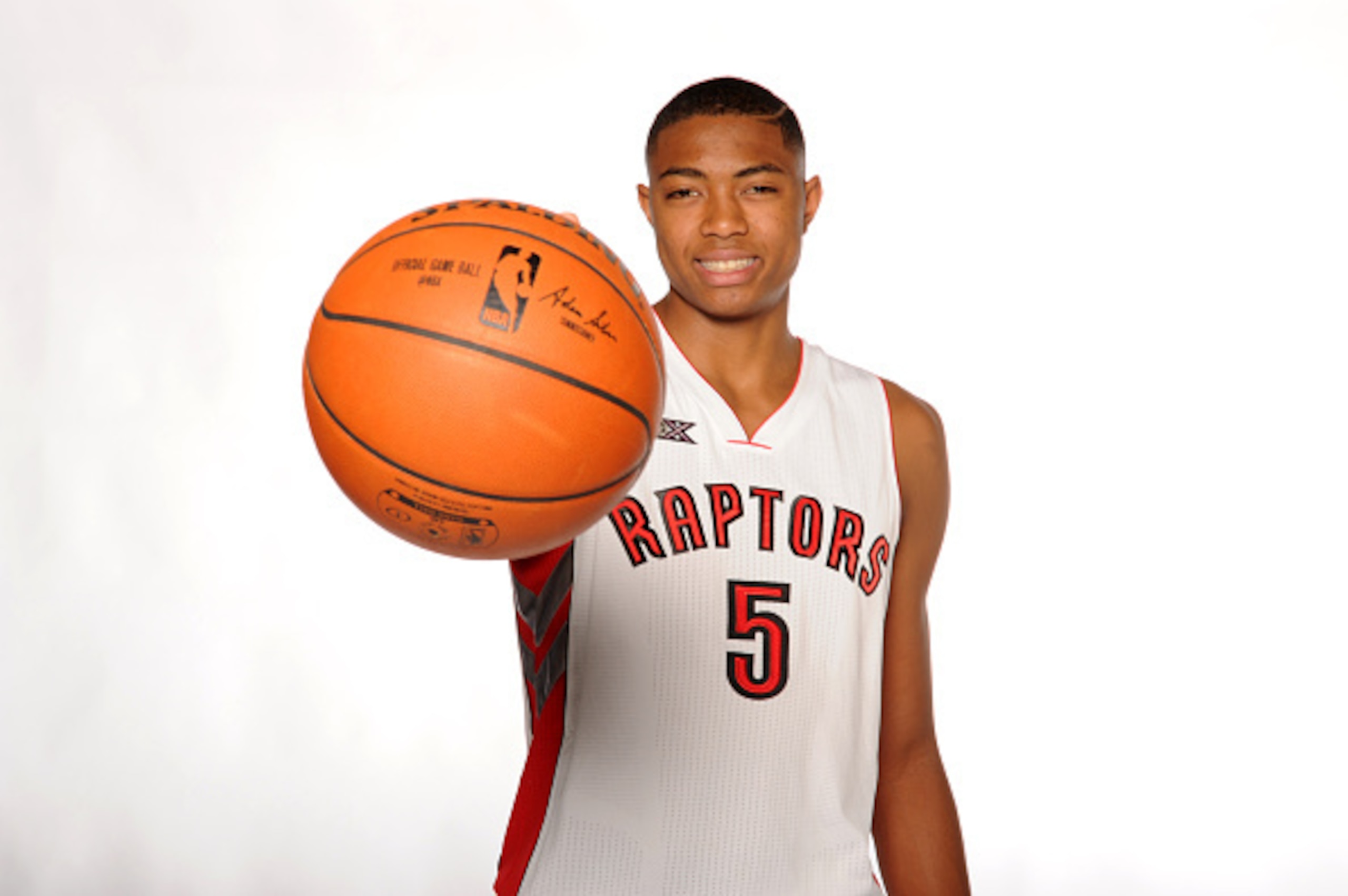 TORONTO-SEPTEMBER 29:  Bruno Caboclo #5 of the Toronto Raptors poses for a photo during Media Day at the Air Canada Centre in Toronto, Ontario, Canada on September 29, 2014.  NOTE TO USER: User expressly acknowledges and agrees that, by downloading and or