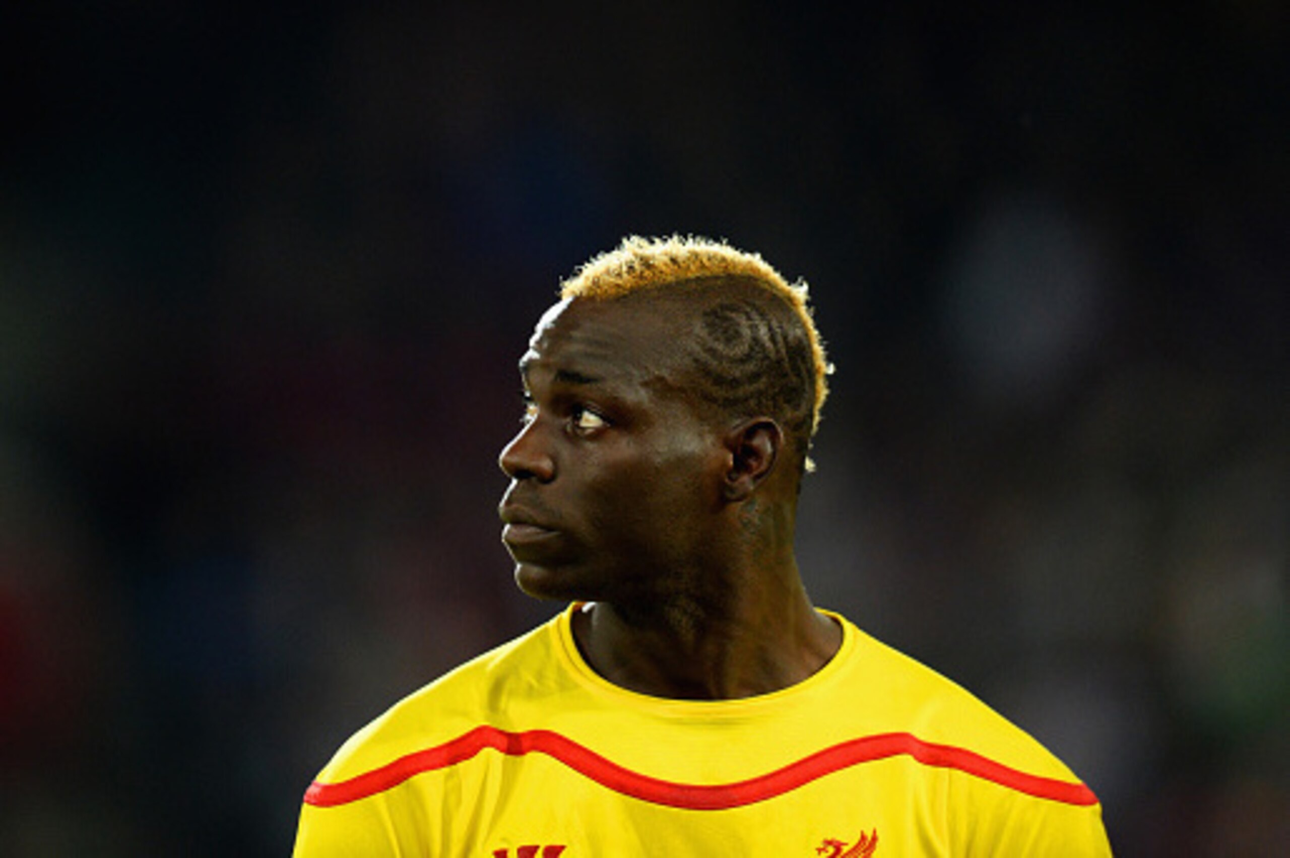 BASEL, SWITZERLAND - OCTOBER 01:  Mario Balotelli of Liverpool looks on during the UEFA Champions League Group B match between FC Basel 1893 and Liverpool FC at St. Jakob Stadium on October 1, 2014 in Basel, Switzerland.  (Photo by Jamie McDonald/Getty Im