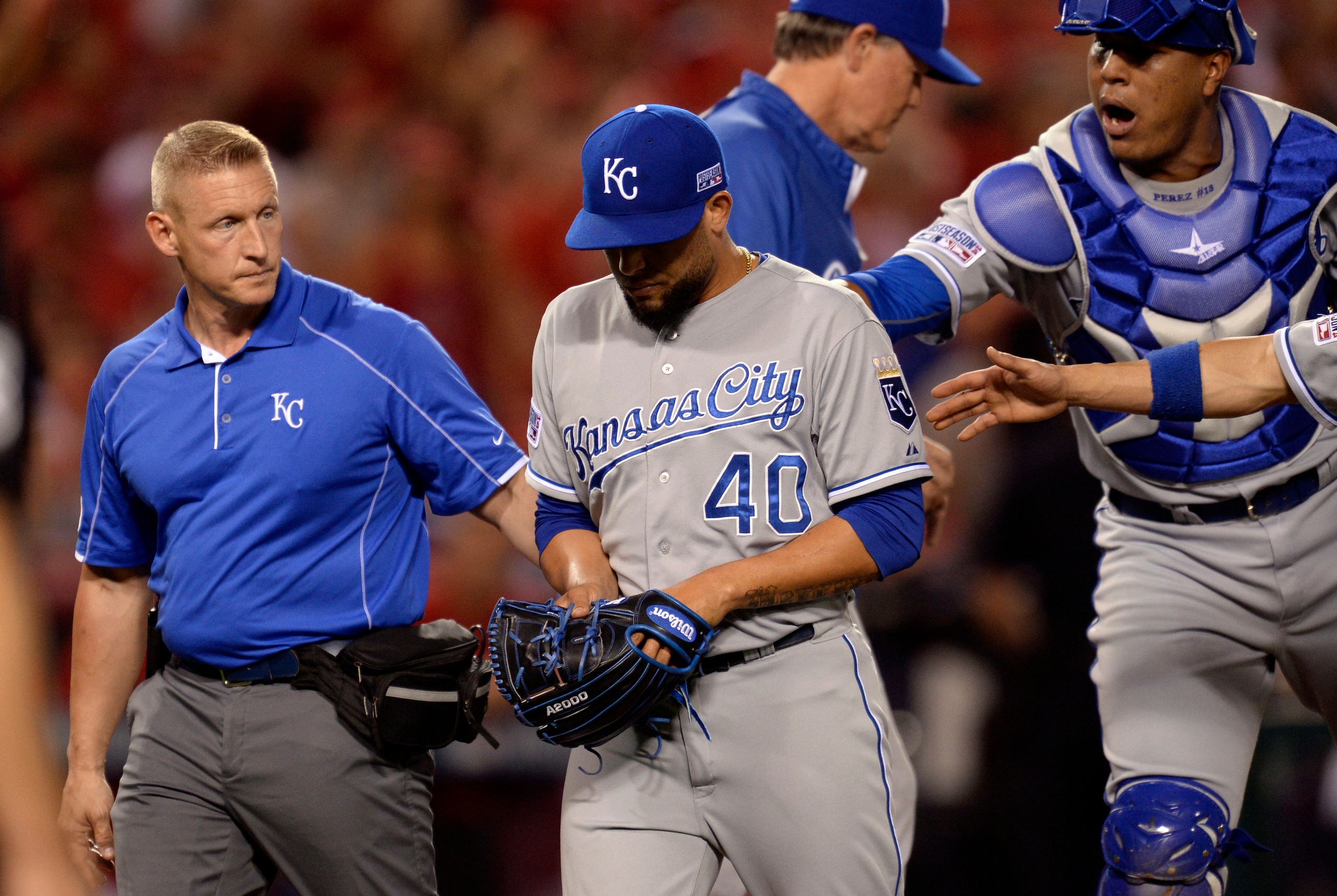 Oct 2, 2014; Anaheim, CA, USA; Kansas City Royals relief pitcher Kelvin Herrera (40) is taken out of the game with an injury during the seventh inning in game one of the 2014 American League divisional series against the Los Angeles Angels at Angel Stadiu