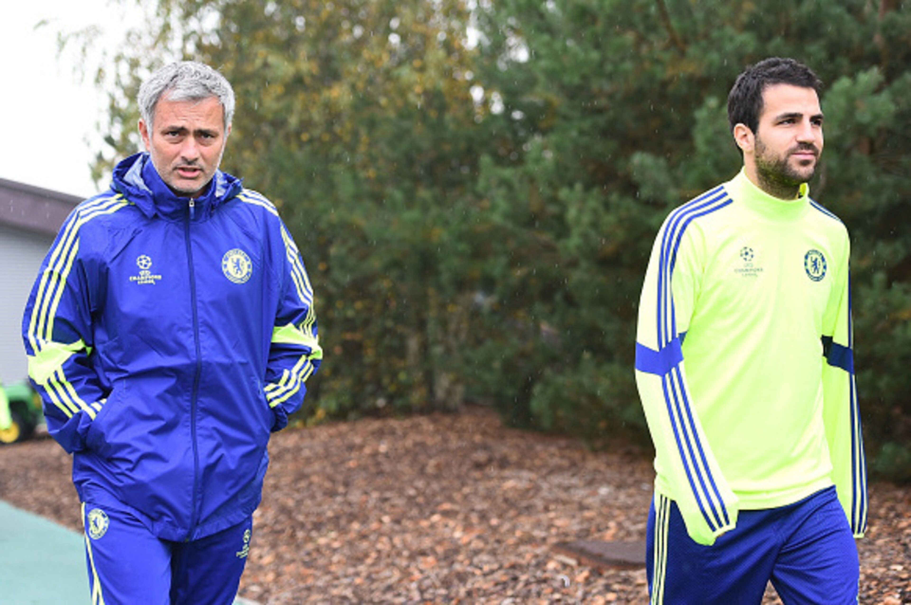 COBHAM, ENGLAND - SEPTEMBER 29:  Manager Jose Mourinho and Cesc Fabregas walks out onto the training pitch during the Chelsea Training Session at Chelsea Training Ground on September 29, 2014 in Cobham, England.  (Photo by Christopher Lee/Getty Images)