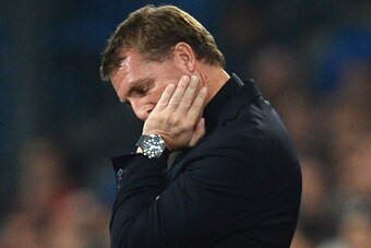 BASEL, SWITZERLAND - OCTOBER 01:  A dejected Brendan Rodgers, manager of Liverpool looks on during the UEFA Champions League Group B match between FC Basel 1893 and Liverpool FC at St. Jakob Stadium on October 1, 2014 in Basel, Switzerland.  (Photo by Jam