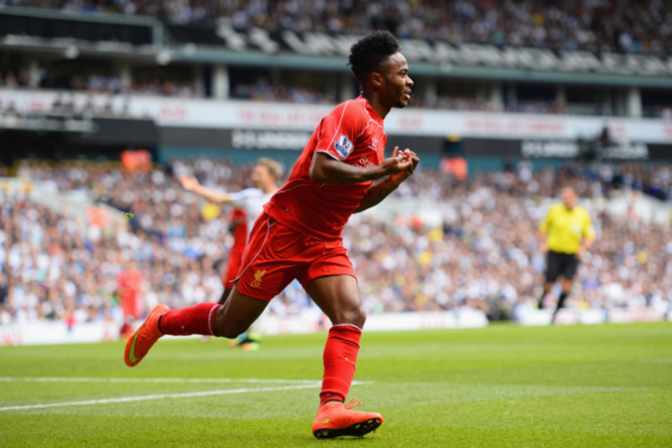 LONDON, ENGLAND - AUGUST 31:  Raheem Sterling of Liverpool celebrates scoring the opening goal during the Barclays Premier League match between Tottenham Hotspur and Liverpool at White Hart Lane on August 31, 2014 in London, England.  (Photo by Jamie McDo
