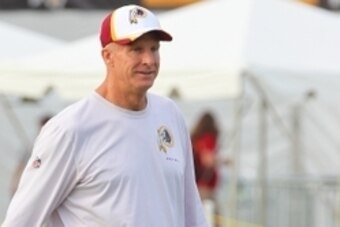 Jul 25, 2014; Richmond, VA, USA; Washington Redskins defensive coordinator Jim Haslett walks onto the field prior to practice on day three of training camp at Bon Secours Washington Redskins Training Center. Mandatory Credit: Geoff Burke-USA TODAY Sports