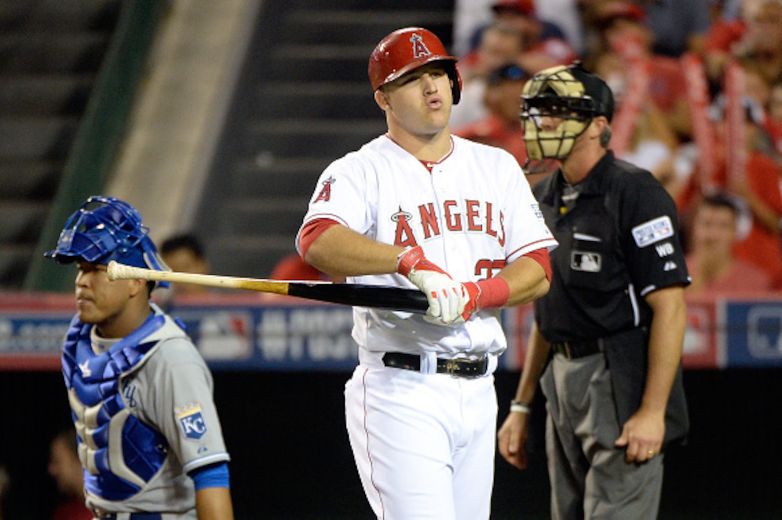 ANAHEIM, CA - OCTOBER 02: Mike Trout #27 of the Los Angeles Angels reacts after a called strike in the eighth inning against the Kansas City Royals during Game One of the American League Division Series at Angel Stadium of Anaheim on October 2, 2014 in An