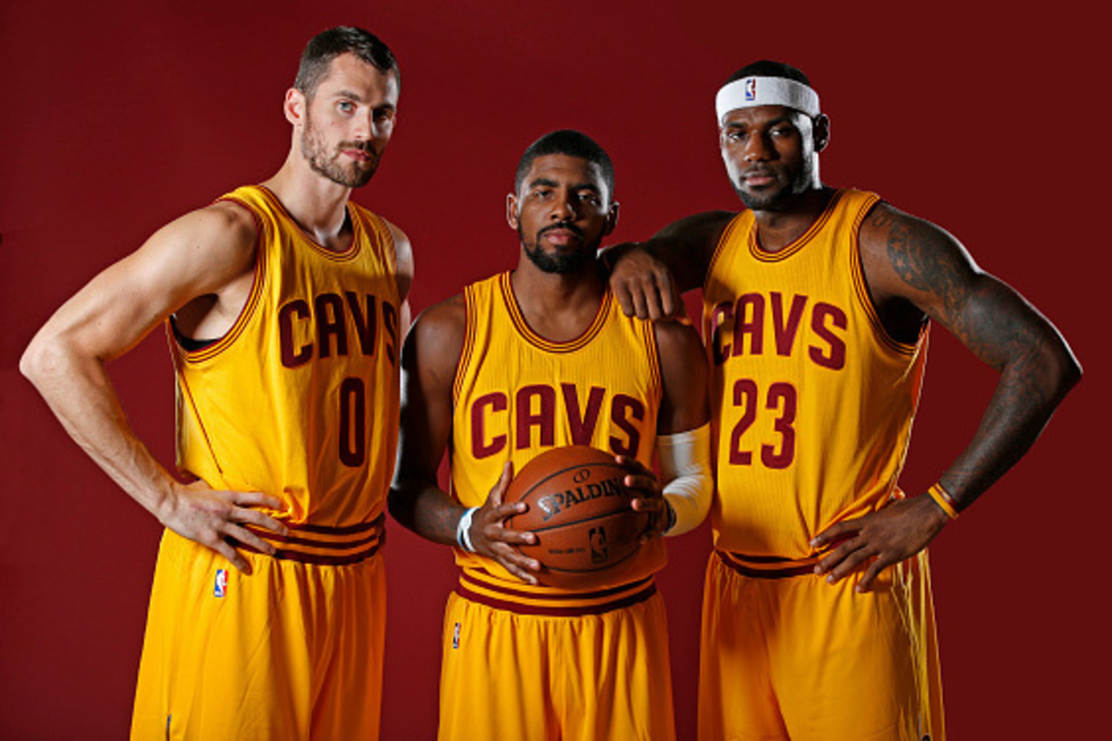 INDEPENDENCE, OH - SEPTEMBER 26:  Kevin Love #0, Kyrie Irving #2 and LeBron James #23 of the Cleveland Cavaliers poses for a photo during media day on September 26, 2014 at the Cleveland Clinic Courts in Independence, Ohio.  NOTE TO USER: User expressly a