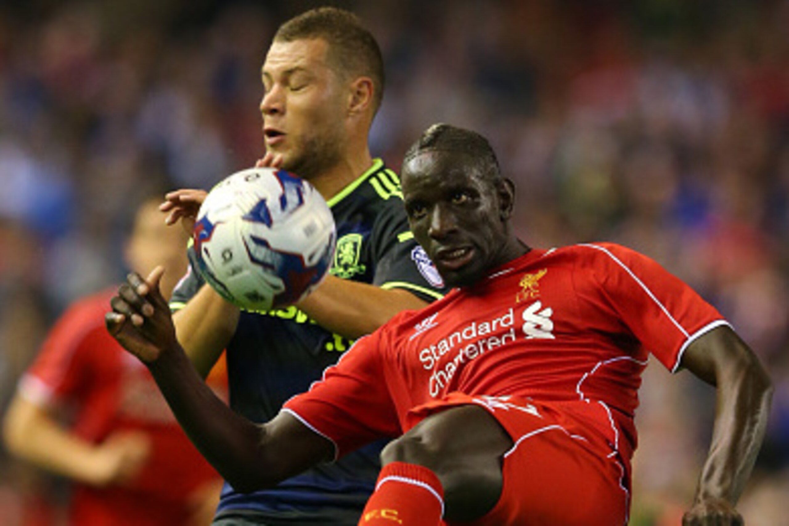 LIVERPOOL, ENGLAND - SEPTEMBER 23:  Mamadou Sakho of Liverpool clears the ball during the Capital One Cup Third Round match between Liverpool and Middlesbrough at Anfield on September 23, 2014 in Liverpool, England.  (Photo by Alex Livesey/Getty Images)