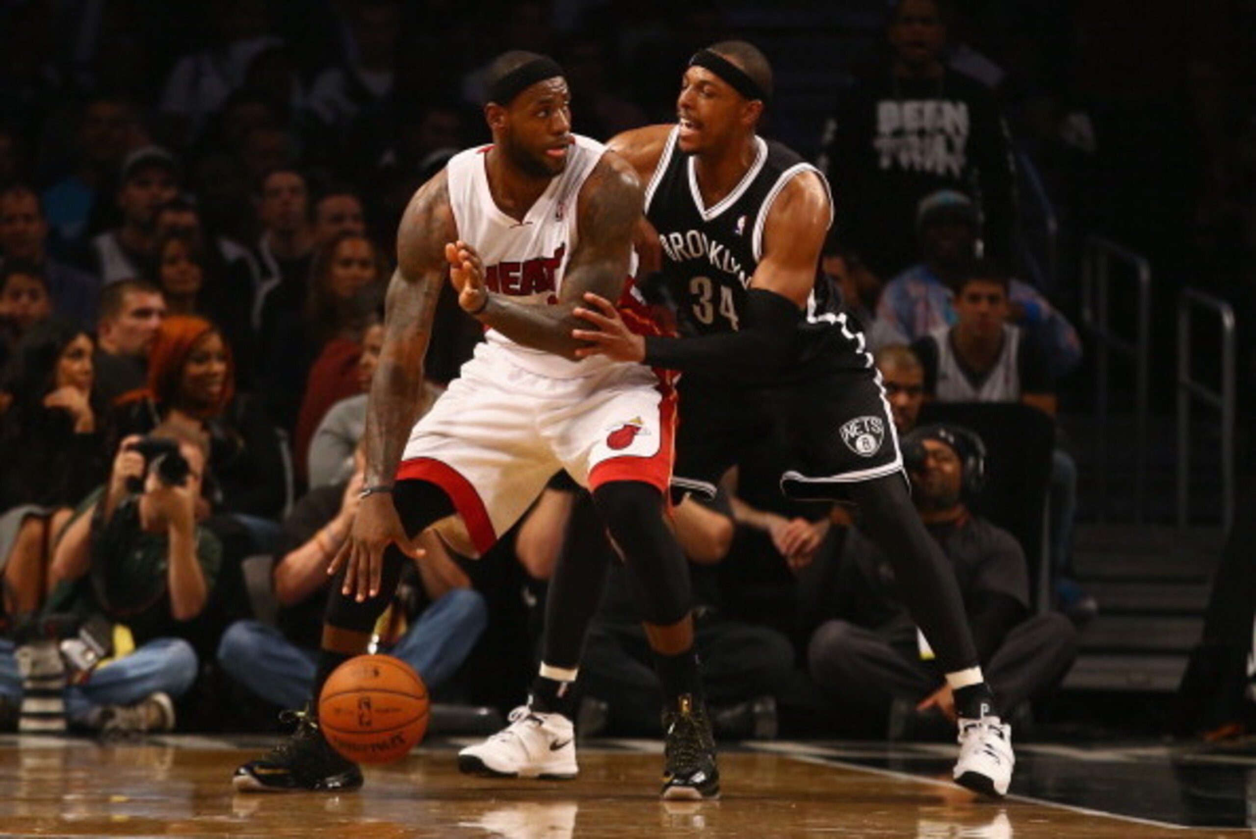 NEW YORK, NY - NOVEMBER 01: LeBron James #6 of the Miami Heat dribbles against Paul Pierce #34 of the Brooklyn Nets during their game at the Barclays Center on November 1, 2013 in the Brooklyn borough of New York City. NOTE TO USER: User expressly acknow NEW YORK, NY - NOVEMBER 01: LeBron James #6 of the Miami Heat dribbles against Paul Pierce #34 of the Brooklyn Nets during their game at the Barclays Center on November 1, 2013 in the Brooklyn borough of New York City. NOTE TO USER: User expressly acknow