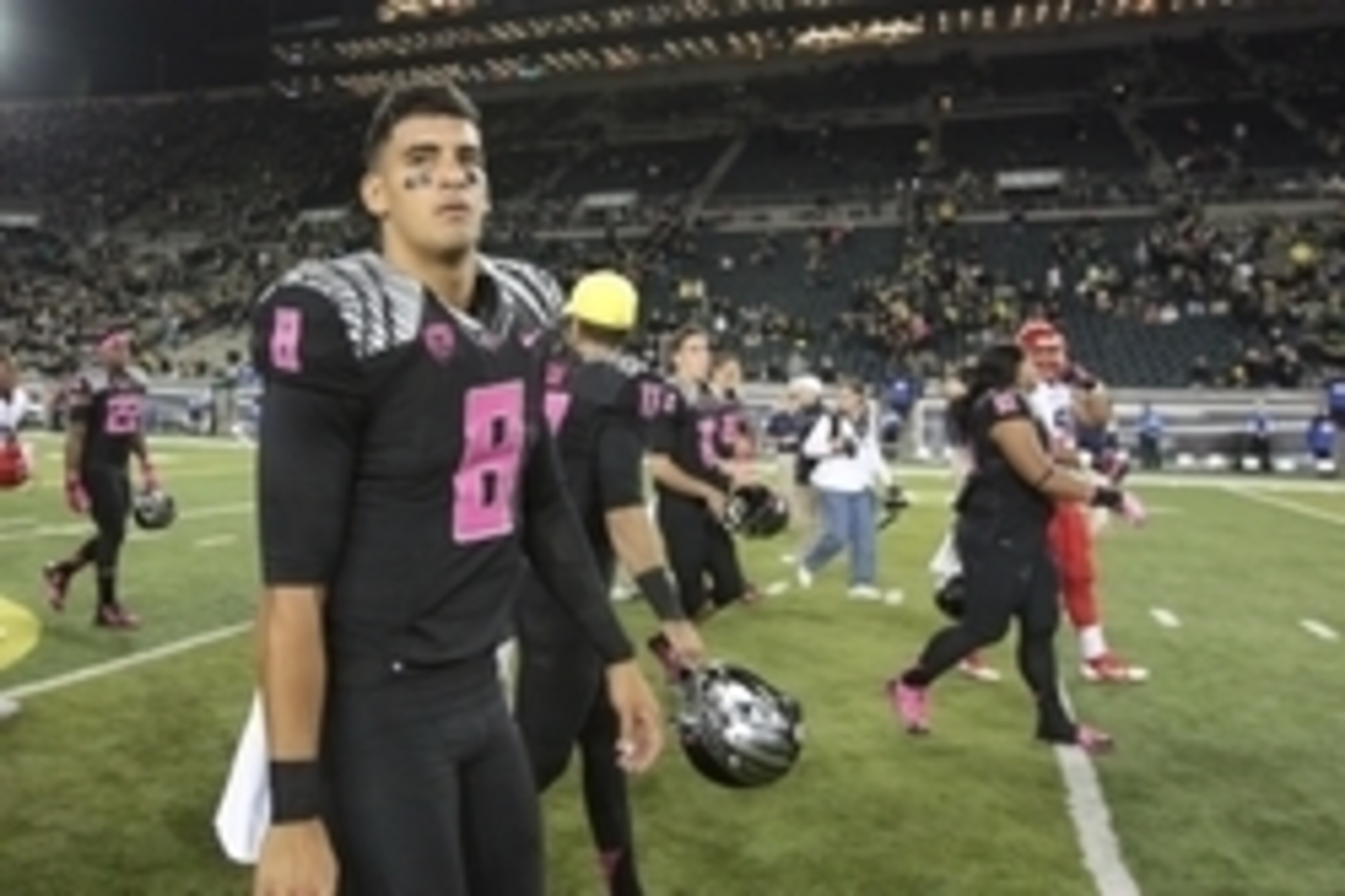 Oct 2, 2014; Eugene, OR, USA; Oregon Ducks quarterback Marcus Mariota (8) walks off the field after losing to the Arizona Wildcats 24-31 at Autzen Stadium. Mandatory Credit: Scott Olmos-USA TODAY Sports Oct 2, 2014; Eugene, OR, USA; Oregon Ducks quarterback Marcus Mariota (8) walks off the field after losing to the Arizona Wildcats 24-31 at Autzen Stadium. Mandatory Credit: Scott Olmos-USA TODAY Sports