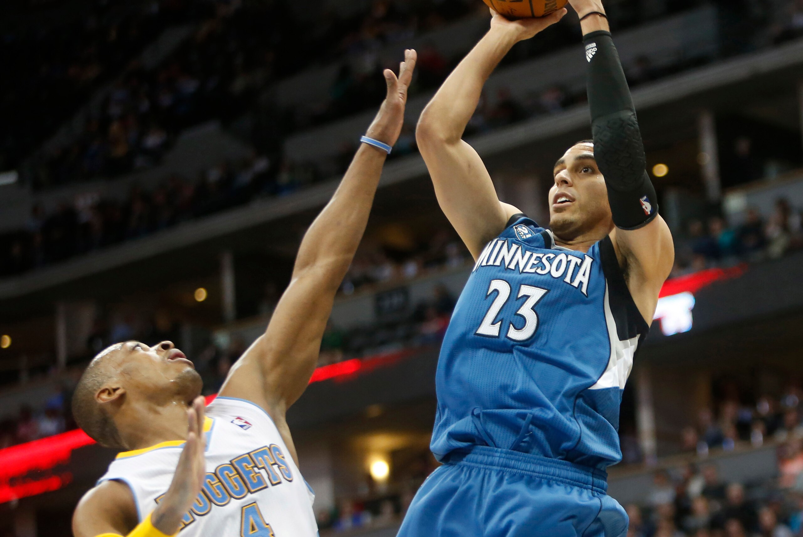 Mar 3, 2014; Denver, CO, USA; Minnesota Timberwolves guard Kevin Martin (23) shoots the ball over Denver Nuggets guard Randy Foye (4) during the second half at Pepsi Center. The Timberwolves won 132-128. Mandatory Credit: Chris Humphreys-USA TODAY Sport Mar 3, 2014; Denver, CO, USA; Minnesota Timberwolves guard Kevin Martin (23) shoots the ball over Denver Nuggets guard Randy Foye (4) during the second half at Pepsi Center. The Timberwolves won 132-128. Mandatory Credit: Chris Humphreys-USA TODAY Sport