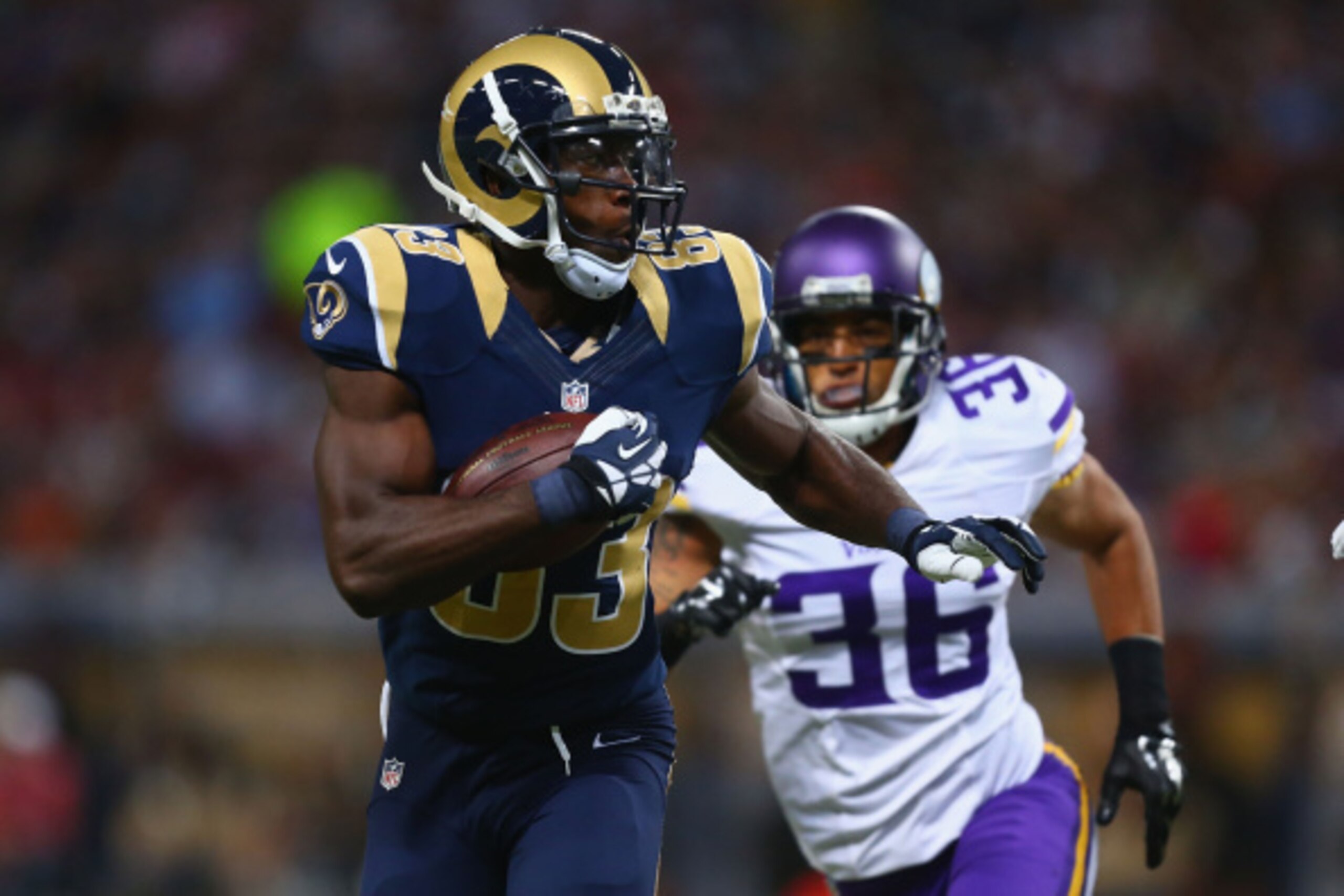ST. LOUIS, MO - SEPTEMBER 7: Brian Quick #83 of the St. Louis Rams runs up field after making a catch against Robert Blanton #36 of the Minnesota Vikings at the Edward Jones Dome on September 7, 2014 in St. Louis, Missouri.  (Photo by Dilip Vishwanat/Gett