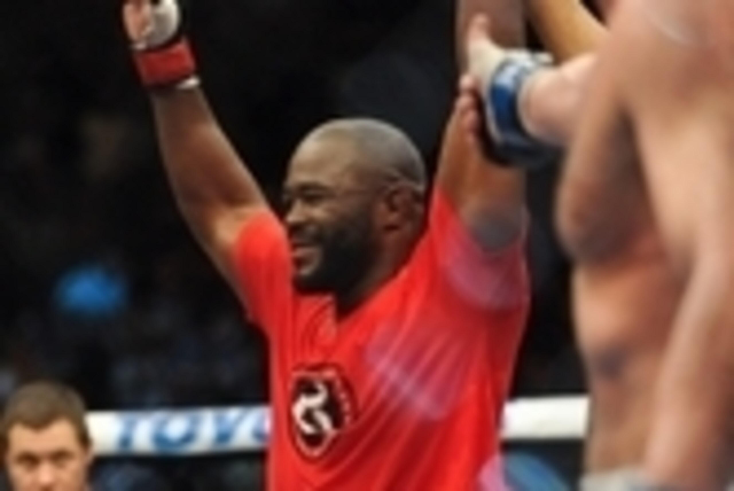 Nov 16, 2013; Las Vegas, NV, USA; Rashad Evans (red gloves) is declared the winner after his light heavyweight bout against Chael Sonnen during UFC 167 at MGM Grand Garden Arena. Mandatory Credit: Stephen R. Sylvanie-USA TODAY Sports