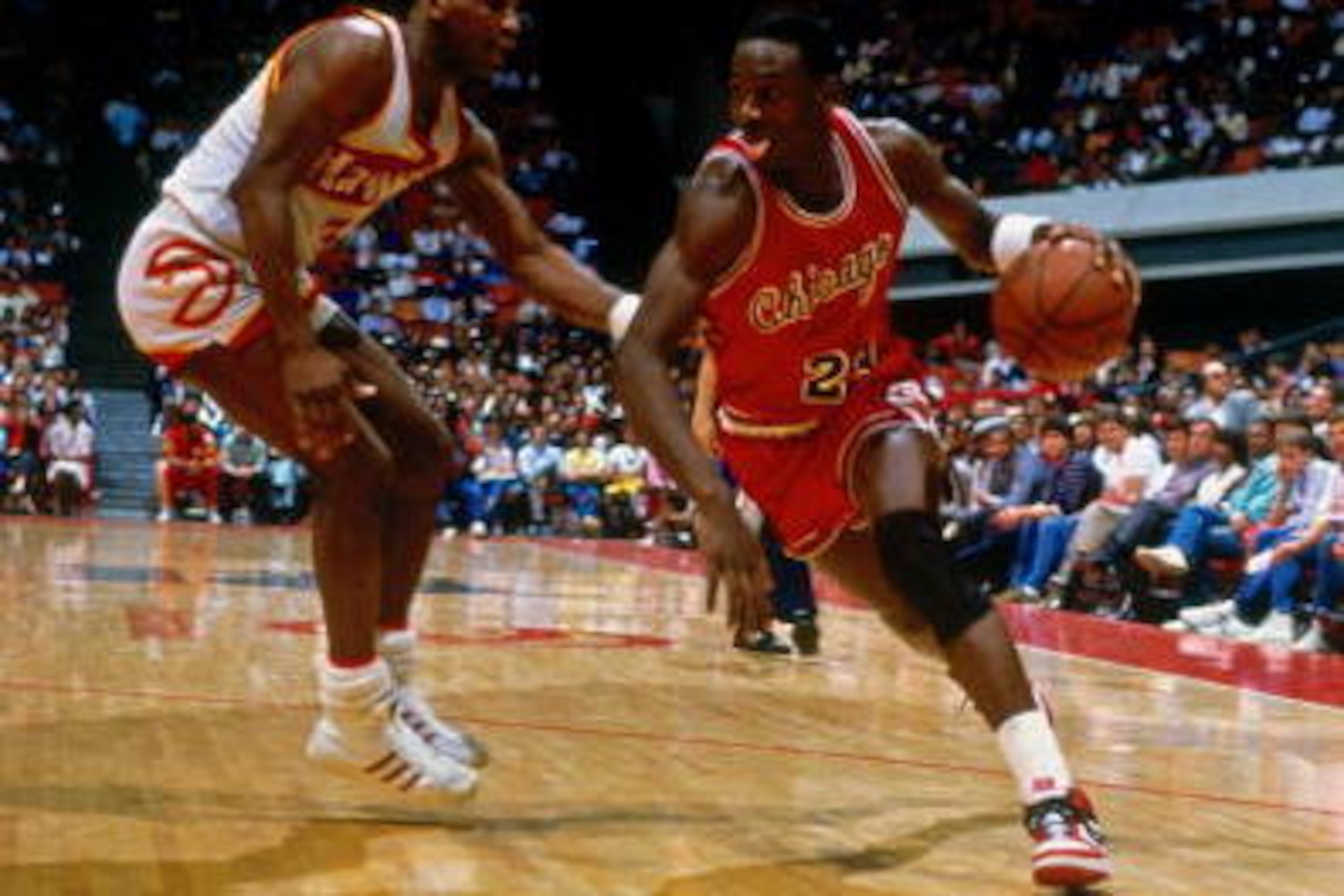 ATLANTA - 1984: Michael Jordan #23 of the Chicago Bulls dribbles against the Atlanta Hawks during his rookie season of 1984 at the Omni in Atlanta, Georgia. NOTE TO USER: User expressly acknowledges and agrees that, by downloading and or using this photog ATLANTA - 1984: Michael Jordan #23 of the Chicago Bulls dribbles against the Atlanta Hawks during his rookie season of 1984 at the Omni in Atlanta, Georgia. NOTE TO USER: User expressly acknowledges and agrees that, by downloading and or using this photog