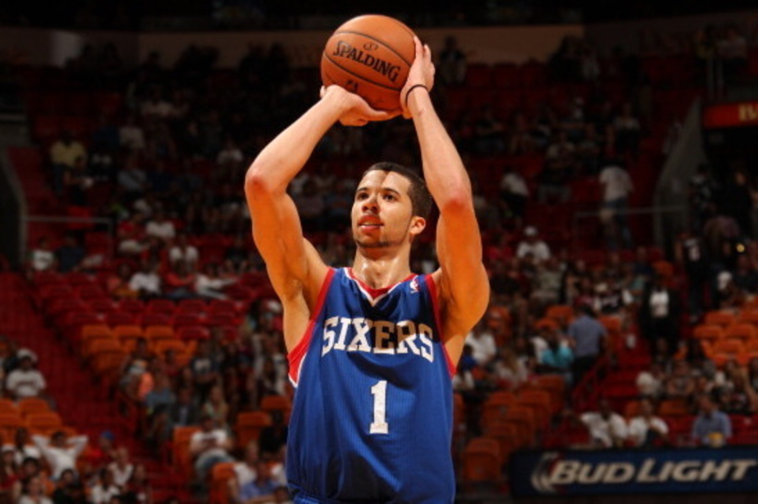 MIAMI, FL - April 16: Michael Carter-Williams #1 of the Philadelphia 76ers shoots against the Miami Heat at the American Airlines Arena in Miami, Florida on April 16, 2014. NOTE TO USER: User expressly acknowledges and agrees that, by downloading and/or u MIAMI, FL - April 16: Michael Carter-Williams #1 of the Philadelphia 76ers shoots against the Miami Heat at the American Airlines Arena in Miami, Florida on April 16, 2014. NOTE TO USER: User expressly acknowledges and agrees that, by downloading and/or u