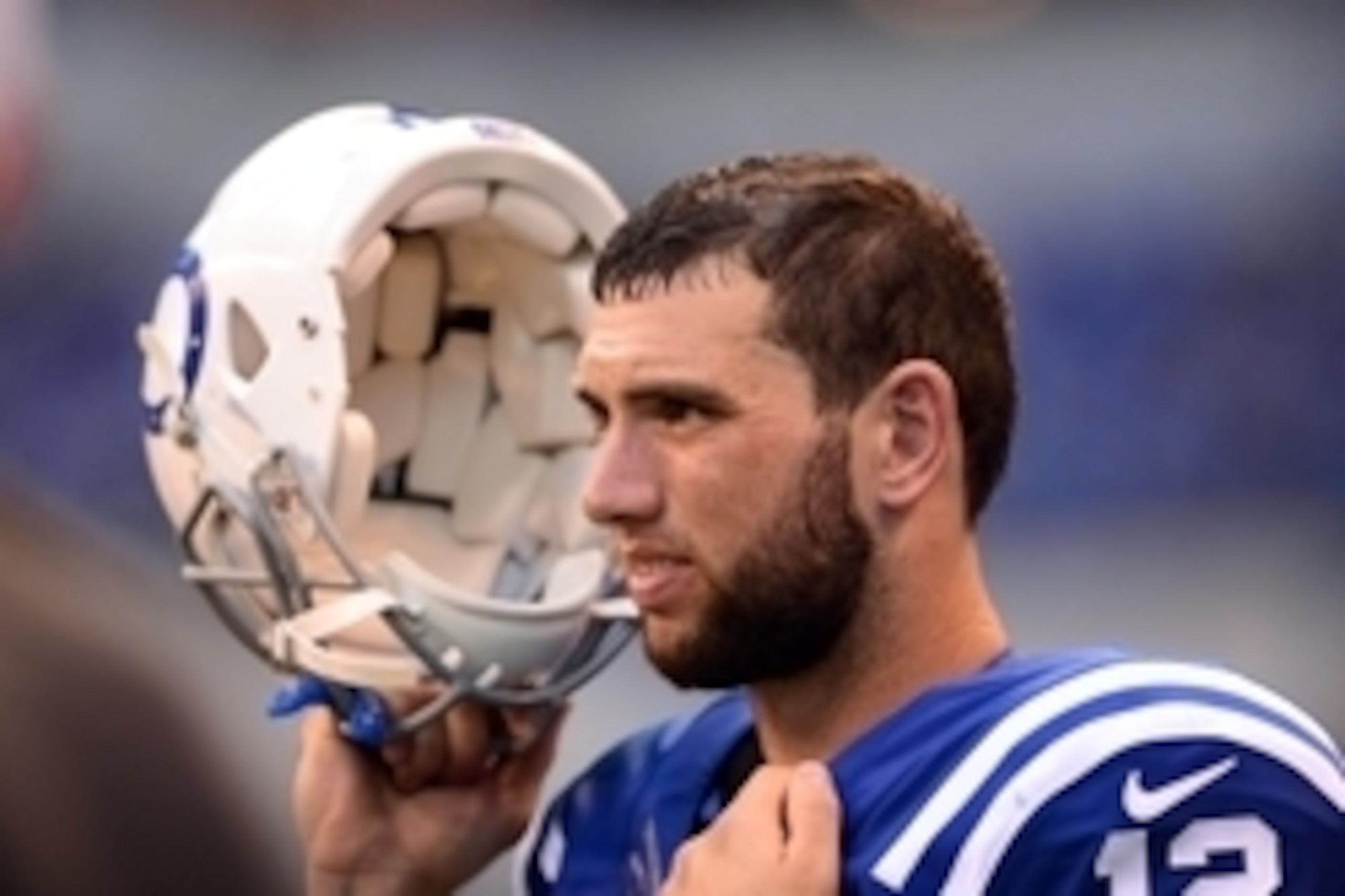 Sep 28, 2014; Indianapolis, IN, USA; Indianapolis Colts quarterback Andrew Luck (12) on the sidelines during the fourth quarter against the Tennessee Titans at Lucas Oil Stadium. Colts defeated the Titans 41-17. Mandatory Credit: Andrew Weber-USA TODAY Sp
