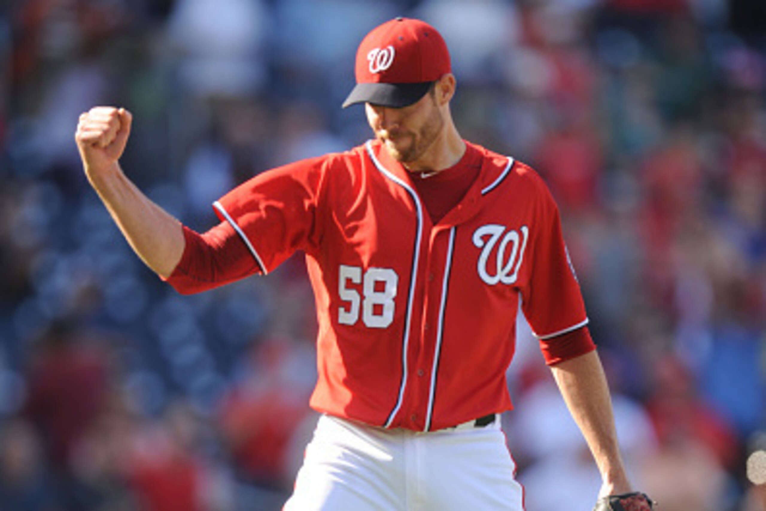 WASHINGTON, DC - SEPTEMBER 26:  Doug Fister #58 of the Washington Nationals celebrates a complete game and shut out win after game one of a doubleheader against the Miami Marlins on September 26, 2014 at Nationals Park in Washington, DC.  The Nationals wo