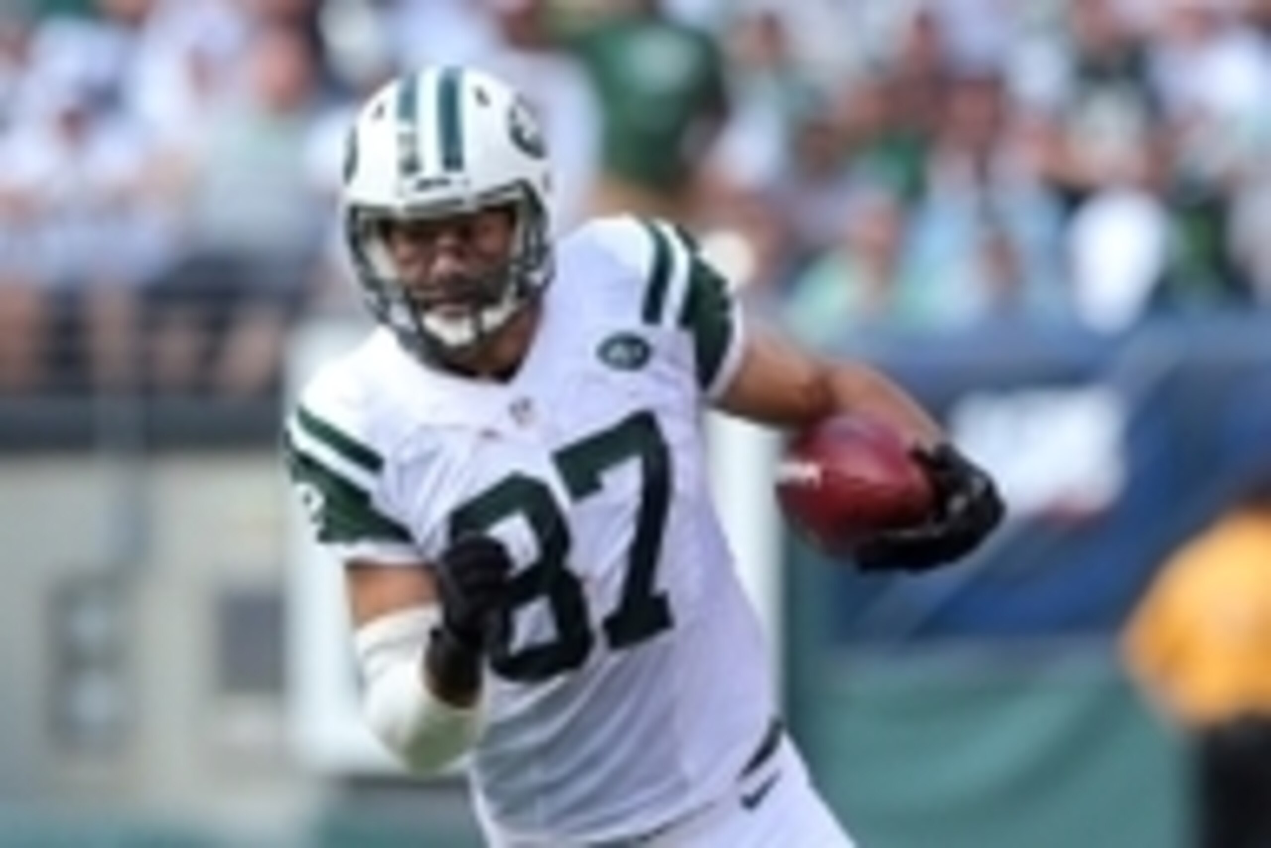 Sep 7, 2014; East Rutherford, NJ, USA; New York Jets wide receiver Eric Decker (87) runs with the ball during a game against the Oakland Raiders at MetLife Stadium. The Jets defeated the Raiders 19-14. Mandatory Credit: Brad Penner-USA TODAY Sports