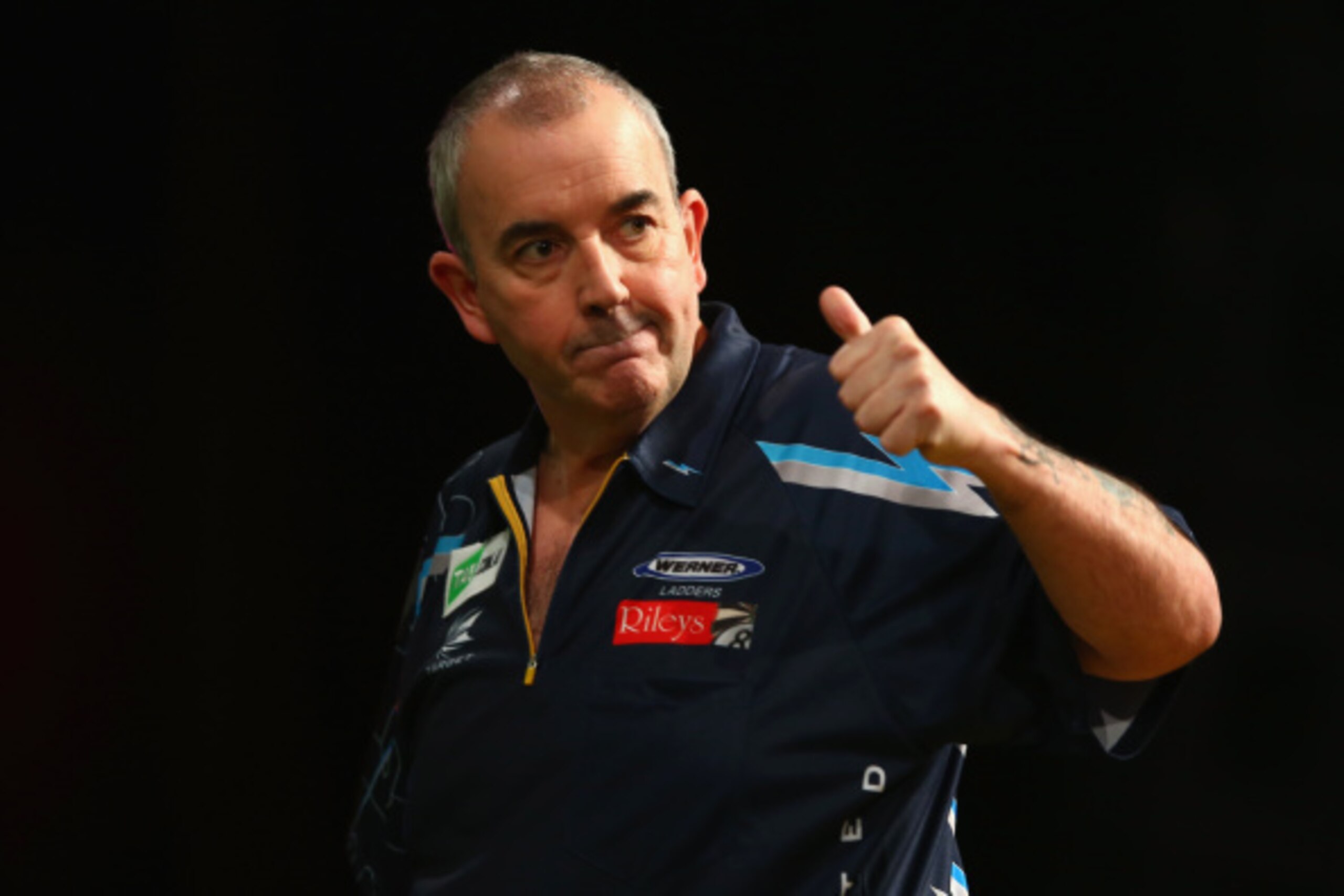 SYDNEY, AUSTRALIA - AUGUST 29:  Phil Taylor of England celebrates during his quarter-final match against Dave Chisnall of England during the Sydney Darts Masters at Hordern Pavilion on August 29, 2014 in Sydney, Australia.  (Photo by Mark Kolbe/Getty Imag