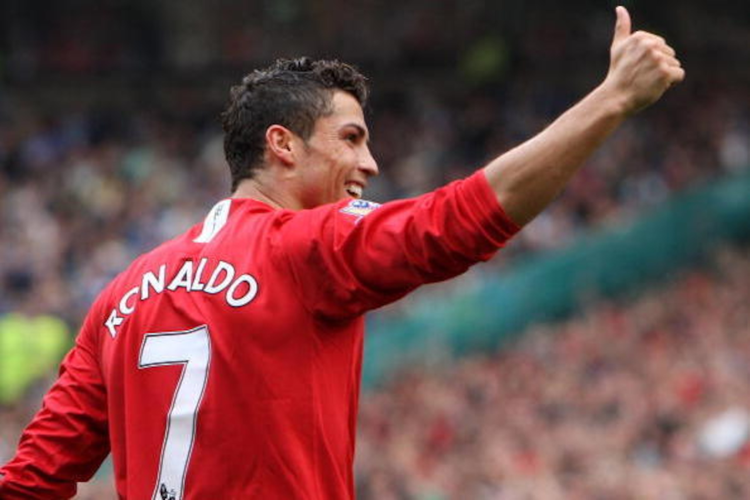 MANCHESTER, UNITED KINGDOM - OCTOBER 06:  Cristiano Ronaldo of Manchester United 2scores against Wigan Athletic during the Barclays Premier League match between Manchester United and Wigan Athletic at Old Trafford on October 06, 2007 in Manchester, Englan