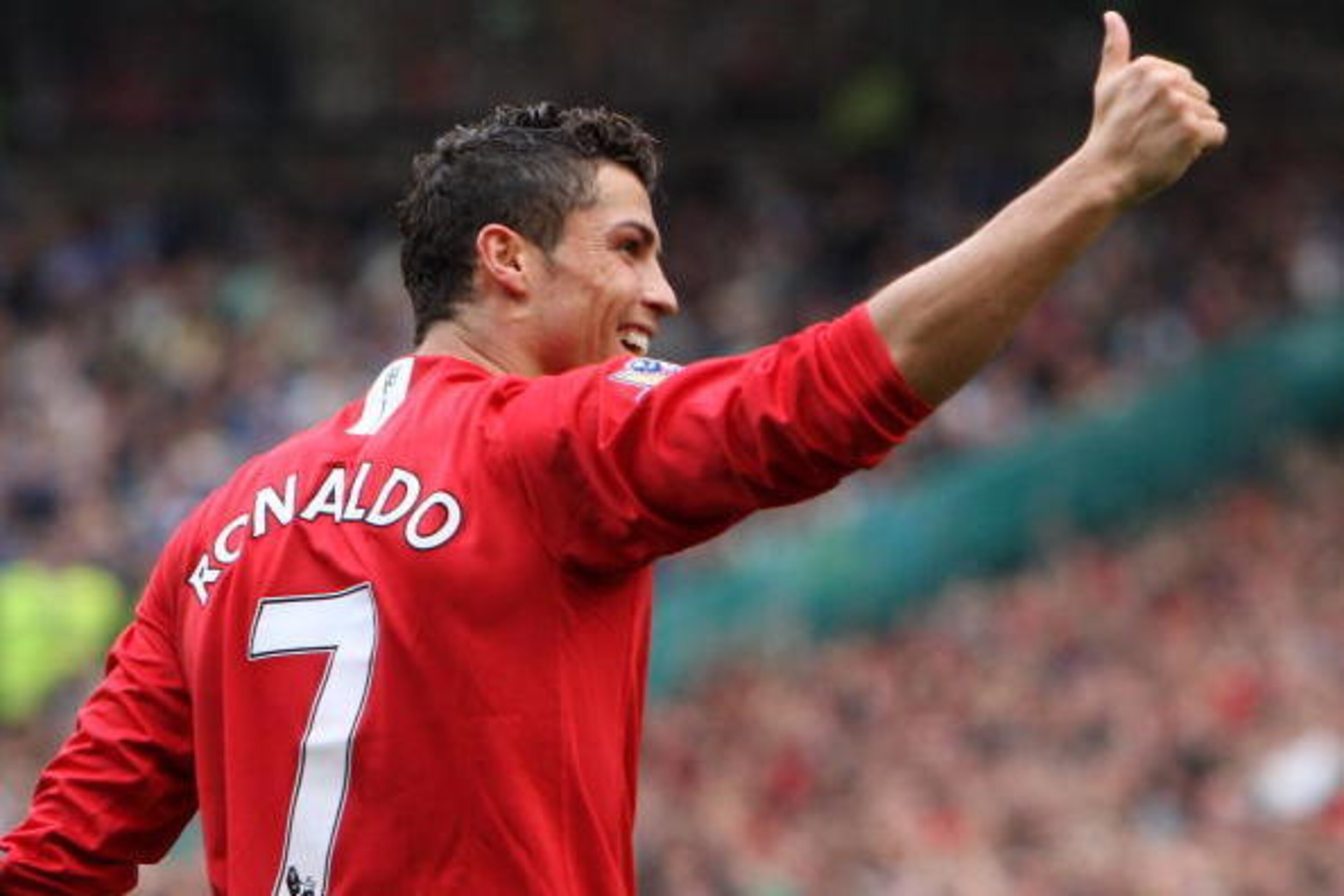 MANCHESTER, UNITED KINGDOM - OCTOBER 06:  Cristiano Ronaldo of Manchester United 2scores against Wigan Athletic during the Barclays Premier League match between Manchester United and Wigan Athletic at Old Trafford on October 06, 2007 in Manchester, Englan